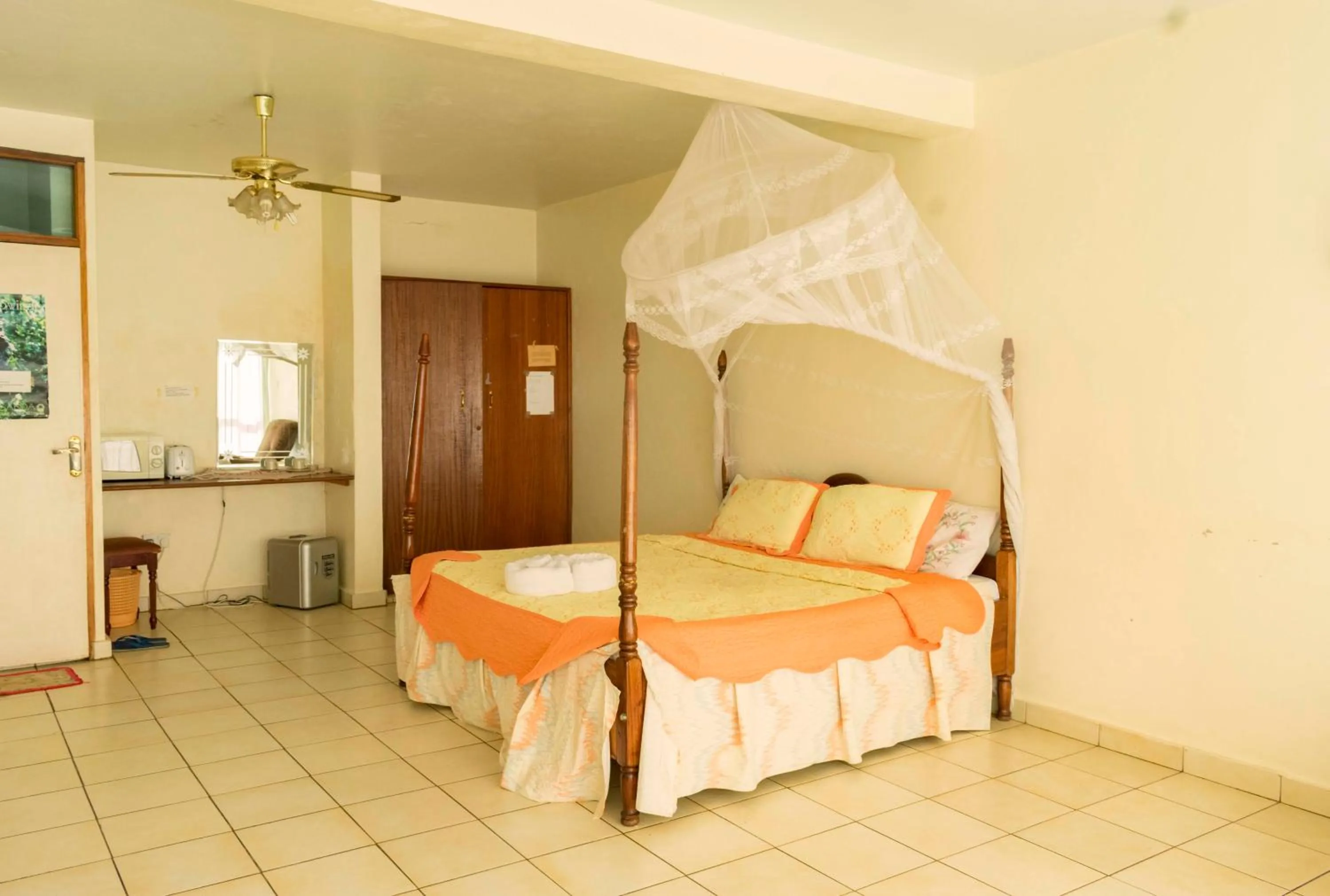 Bed in Sunrise Apartments Hotel Fort Portal