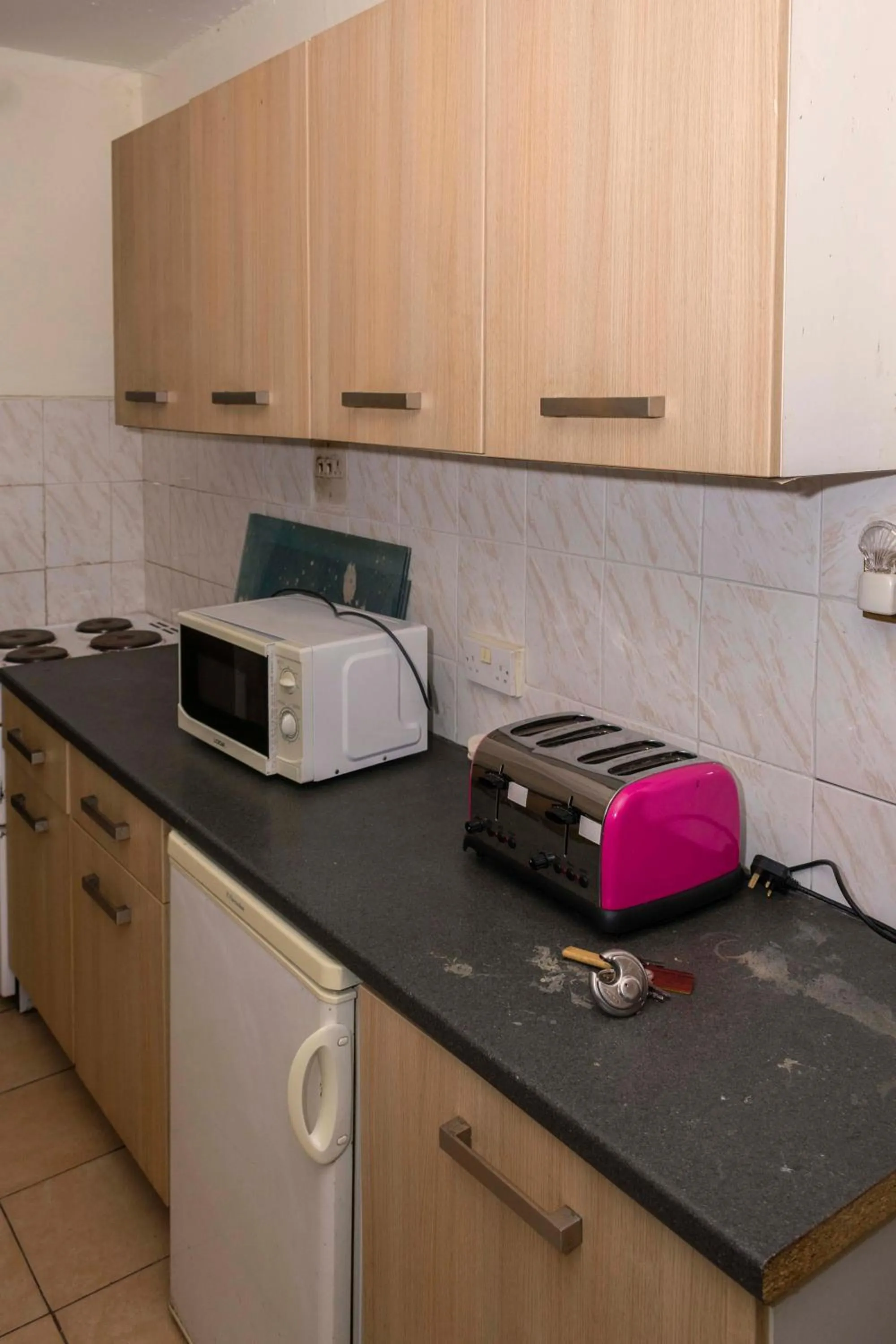 Kitchen or kitchenette in Sunrise Apartments Hotel Fort Portal