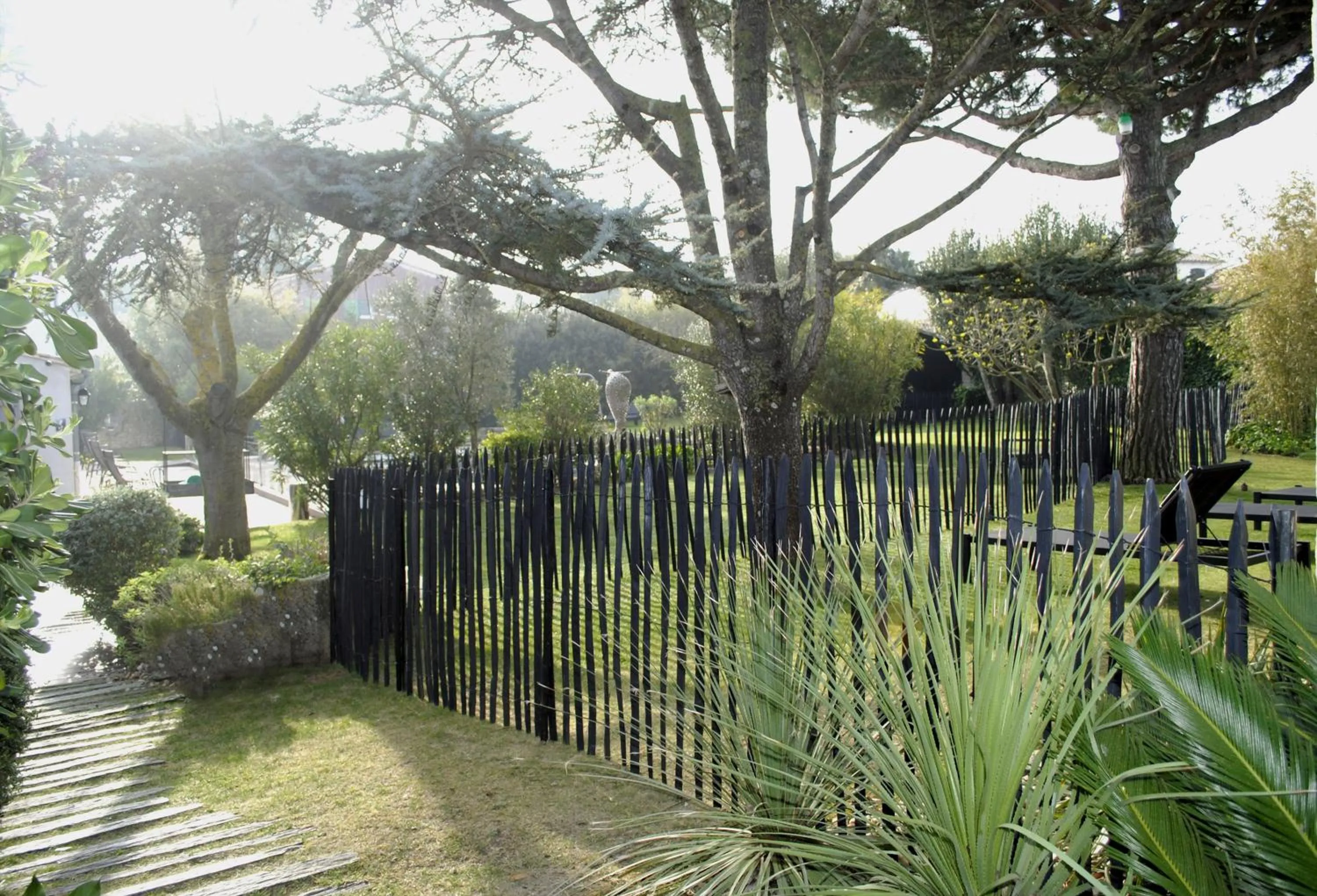 Garden in Le Clos Saint-Martin Hôtel & Spa