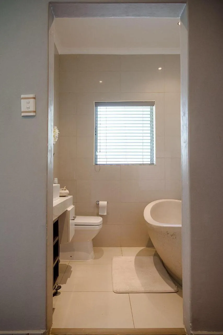 Bathroom in Luxury Upmarket Guesthouse 20 on 4th
