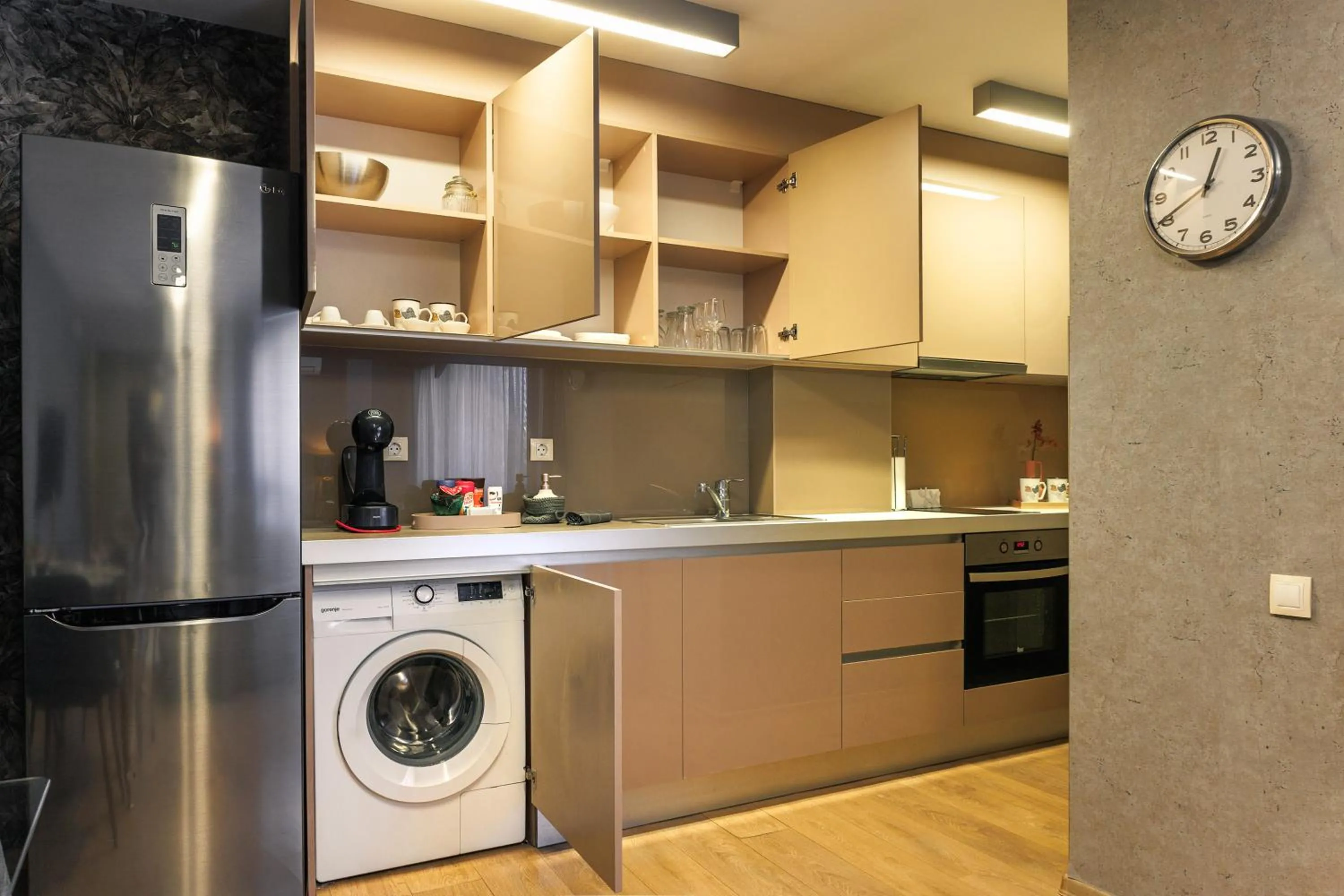 washing machine in City Center Apartments with Parking