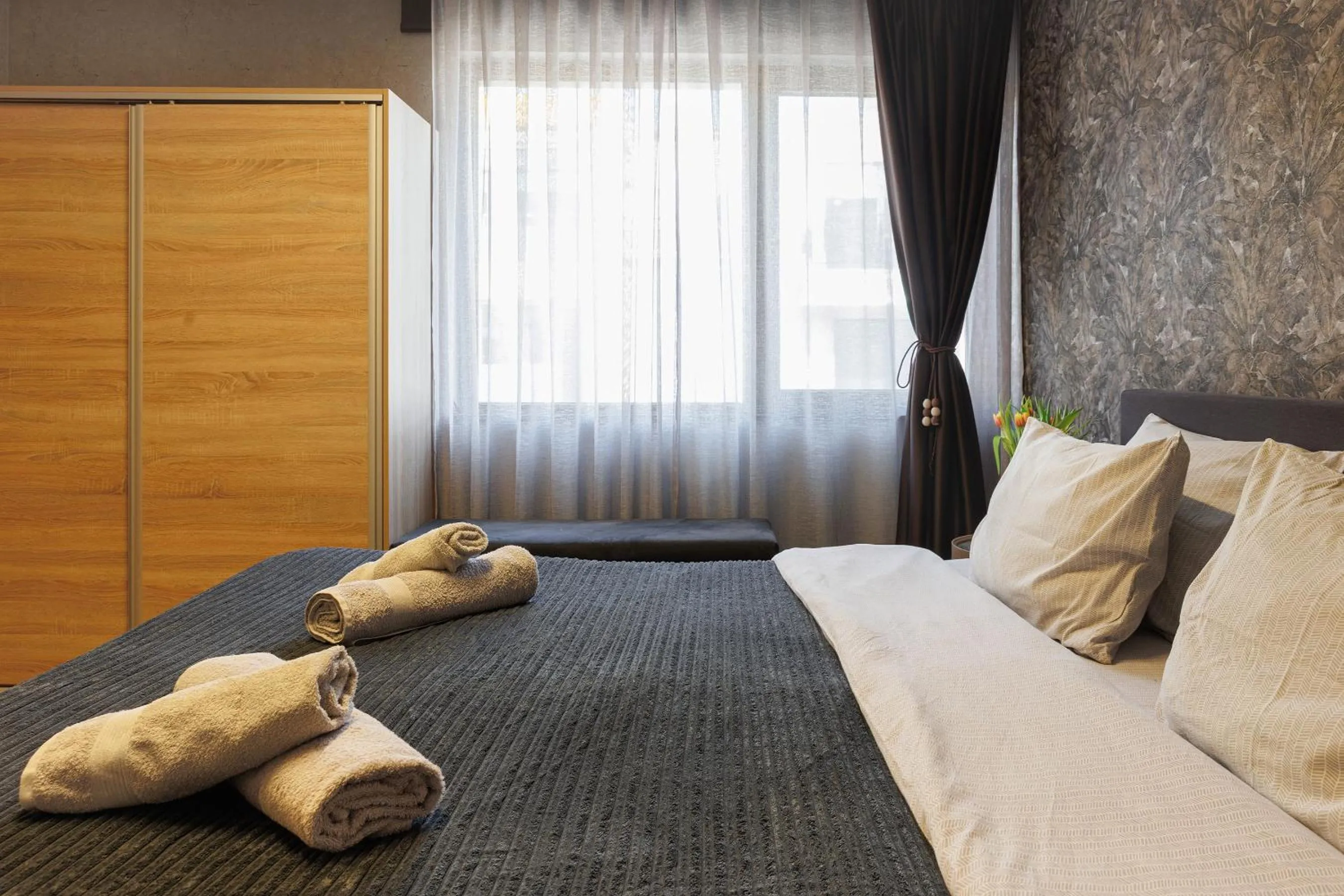 Bedroom, Bed in City Center Apartments with Parking