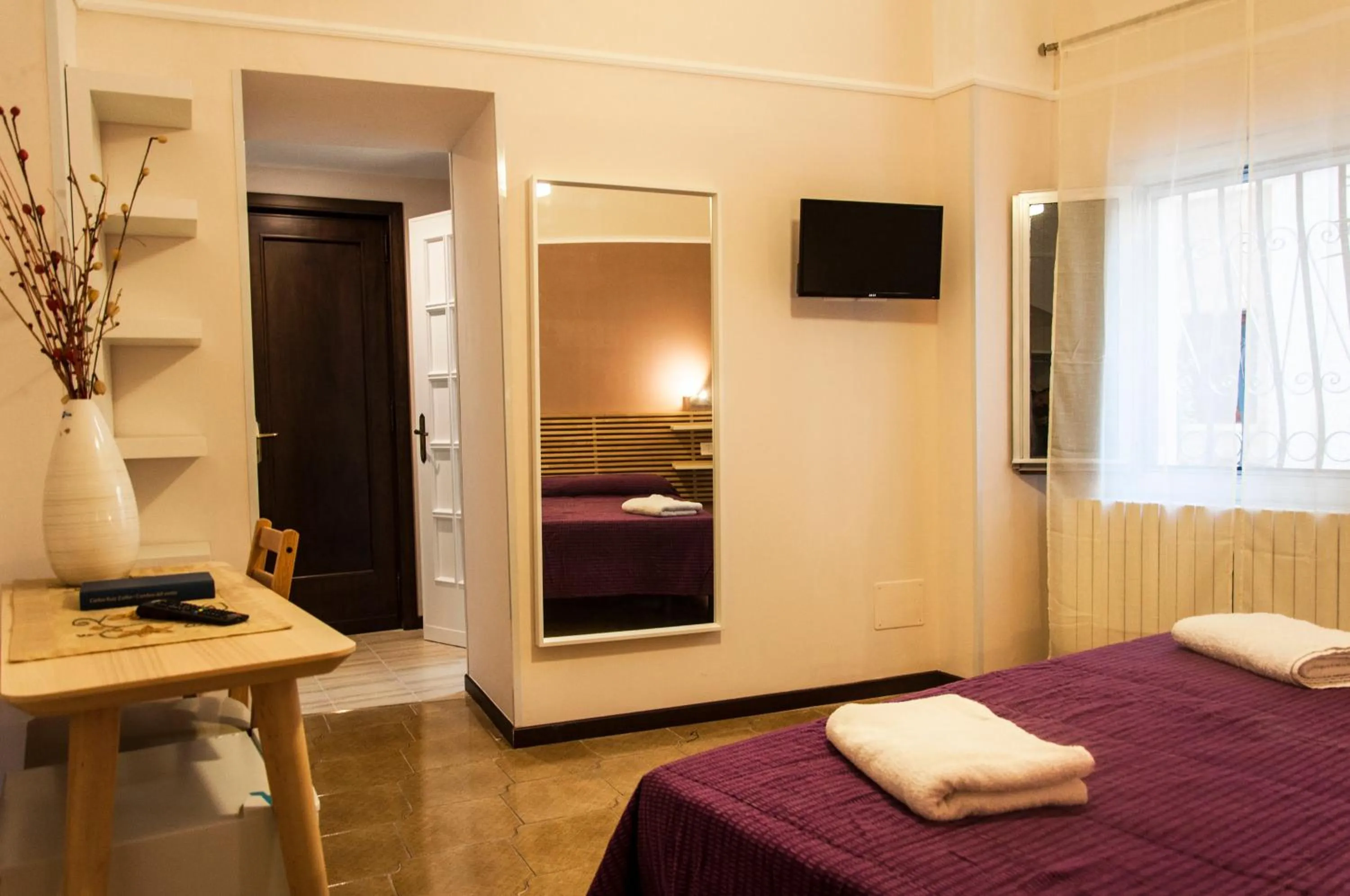 Bed in Palazzo Paladini Rooms Lecce
