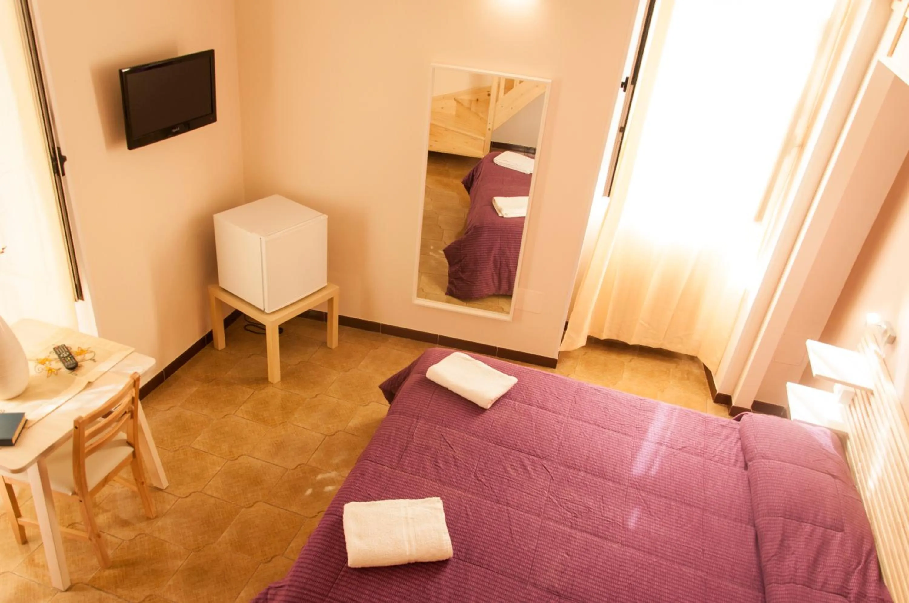 Bed in Palazzo Paladini Rooms Lecce