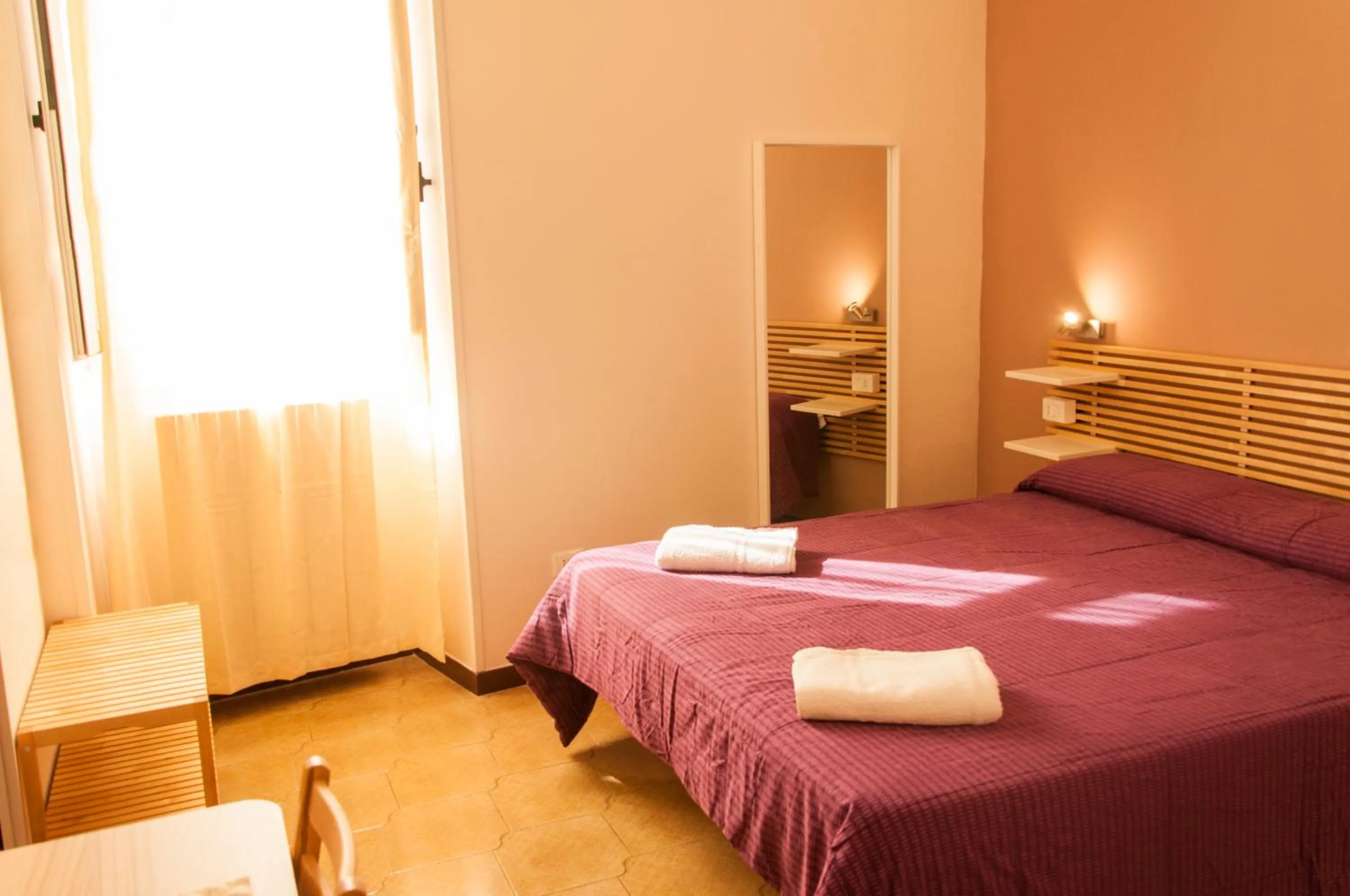 Bed in Palazzo Paladini Rooms Lecce