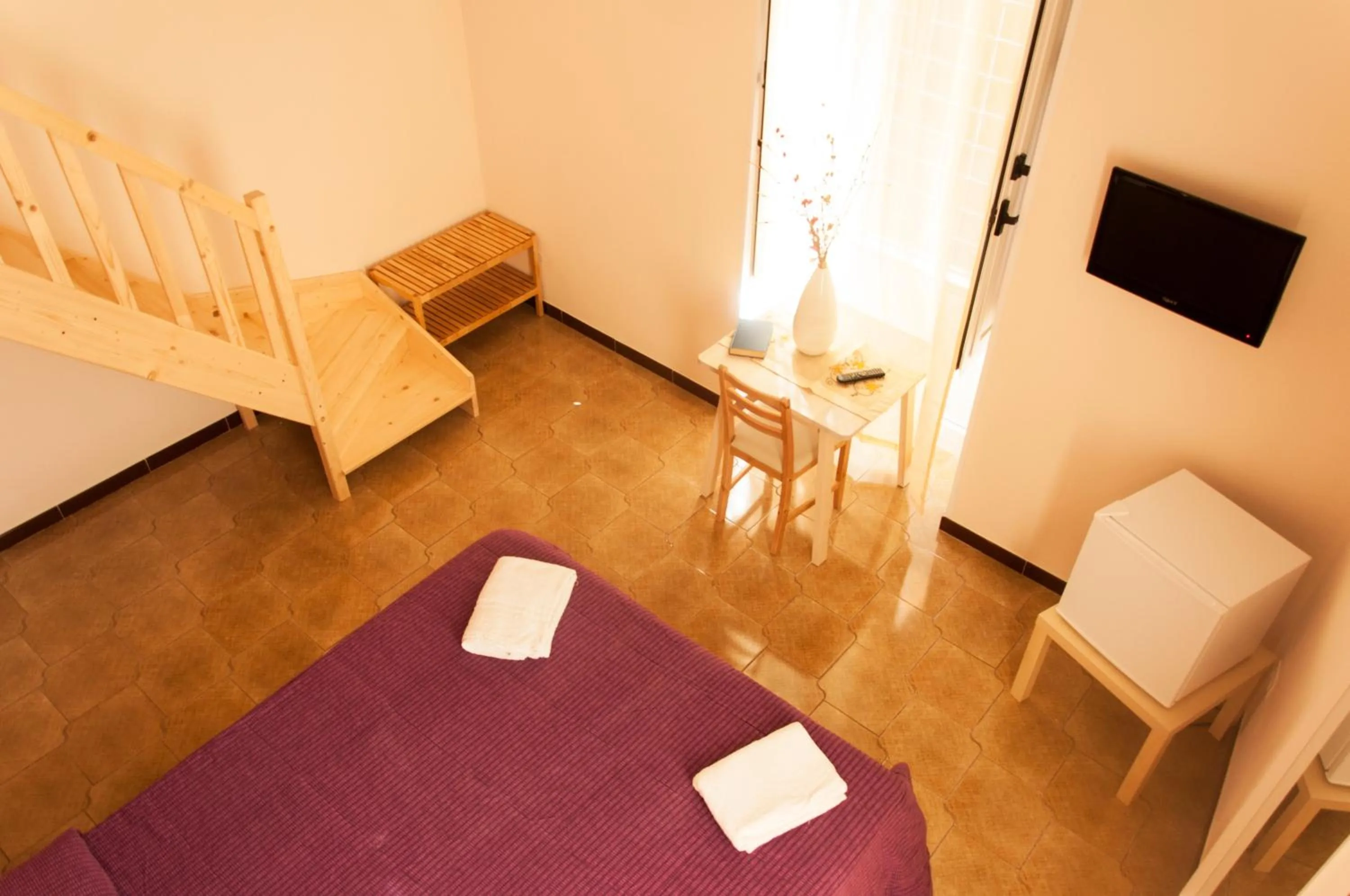 Bed in Palazzo Paladini Rooms Lecce