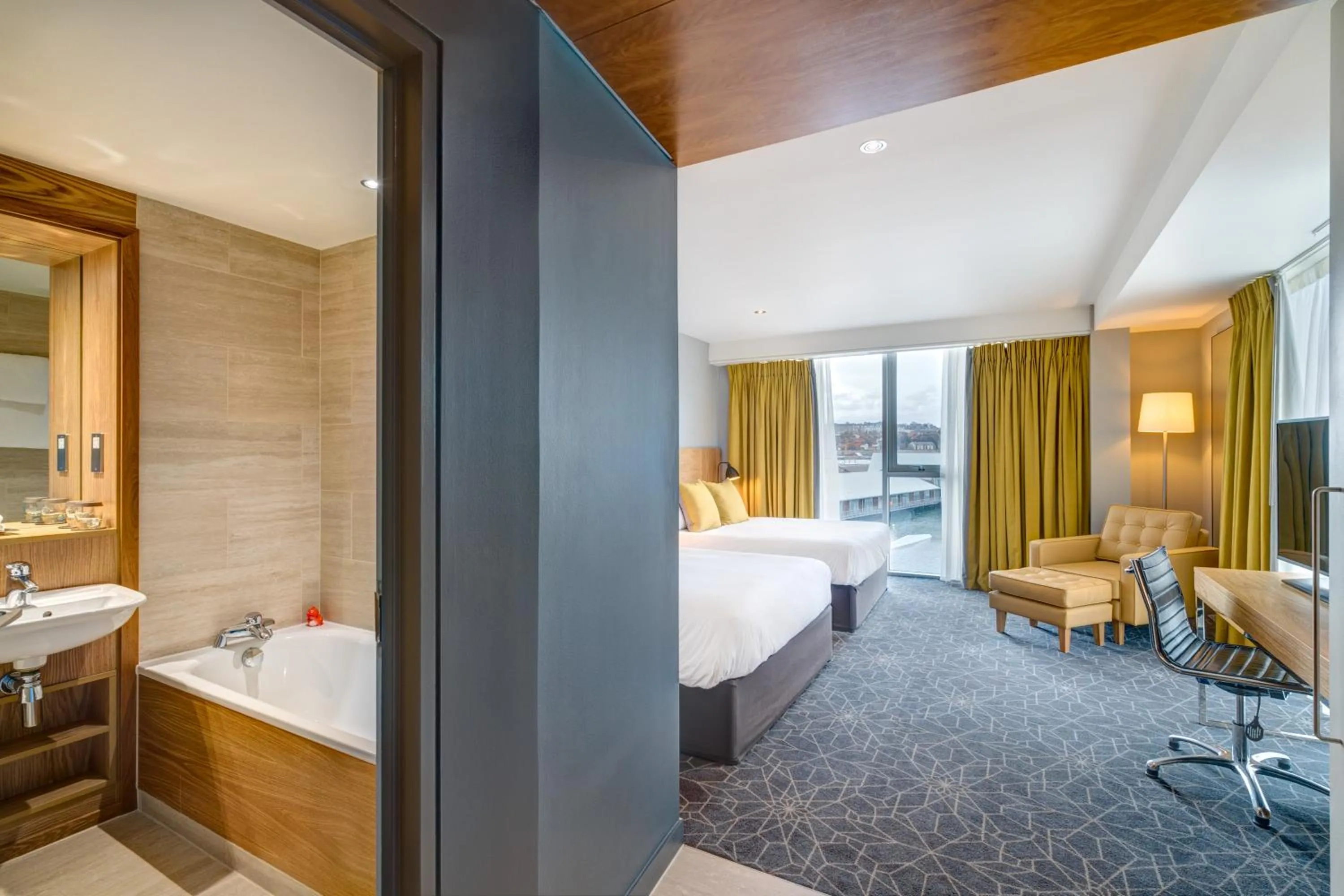 Bed in Apex City Quay Hotel & Spa