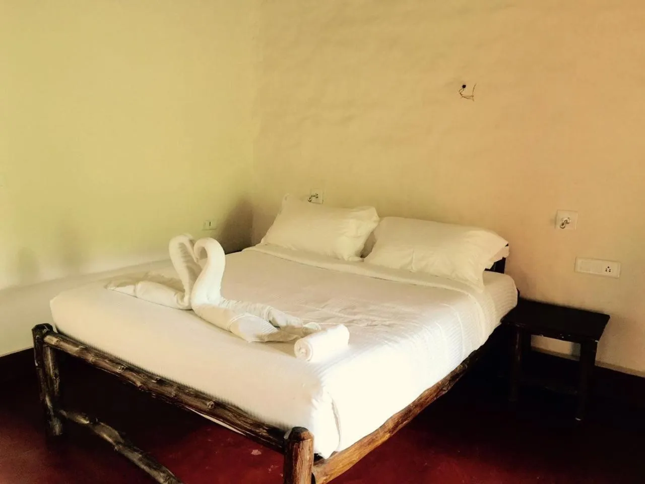 Bed in Deshadan Eco Valley Resort - An Eco friendly Mud House