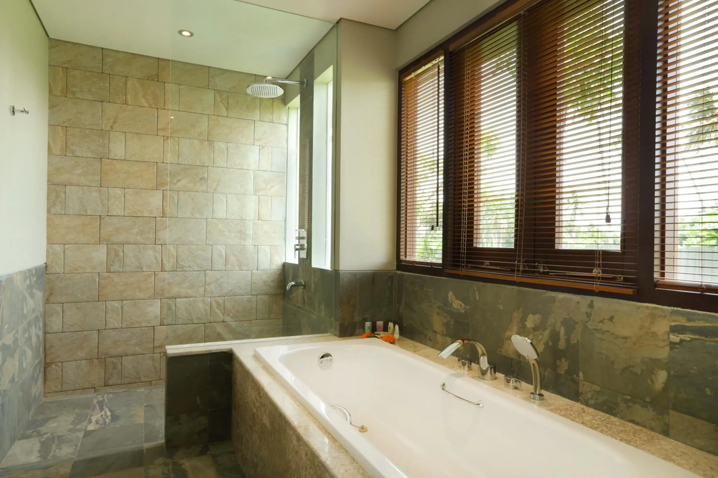 Bathroom in Best Western Premier Agung Resort Ubud Bathroom in Best Western Premier Agung Resort Ubud
