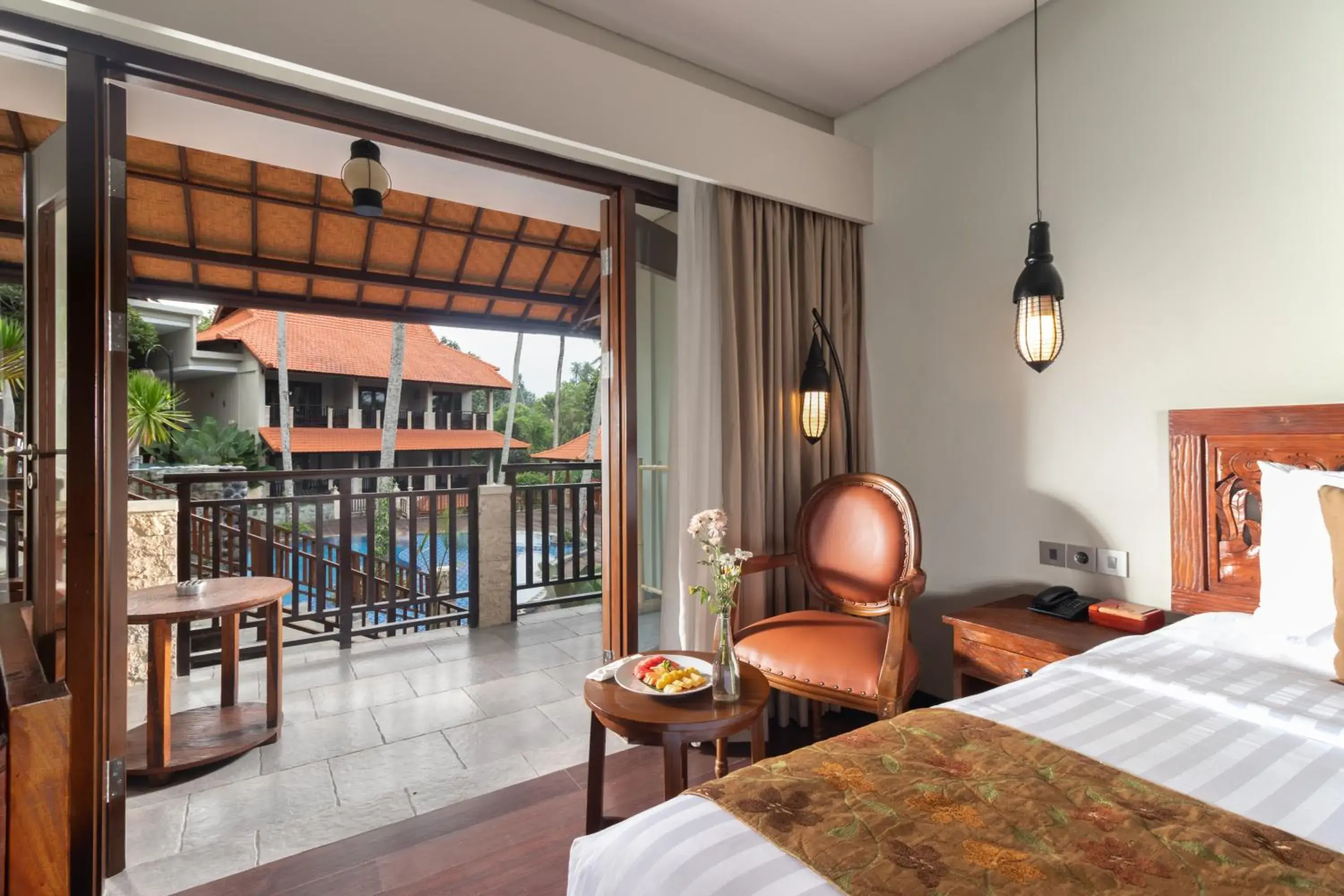 Pool view, Bed in Best Western Premier Agung Resort Ubud Pool view, Bed in Best Western Premier Agung Resort Ubud