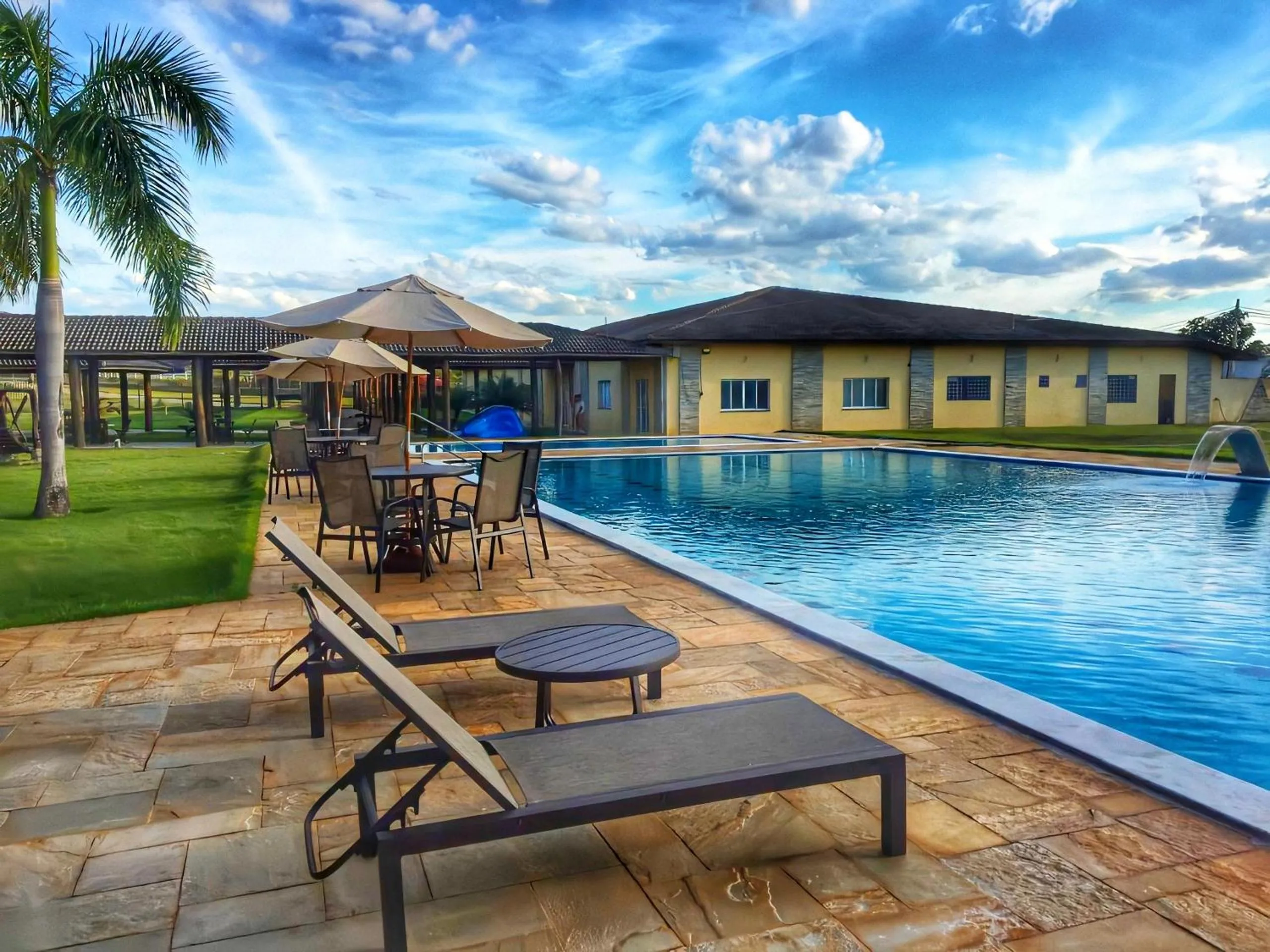 Swimming pool in Pousada Haras Santa Rita