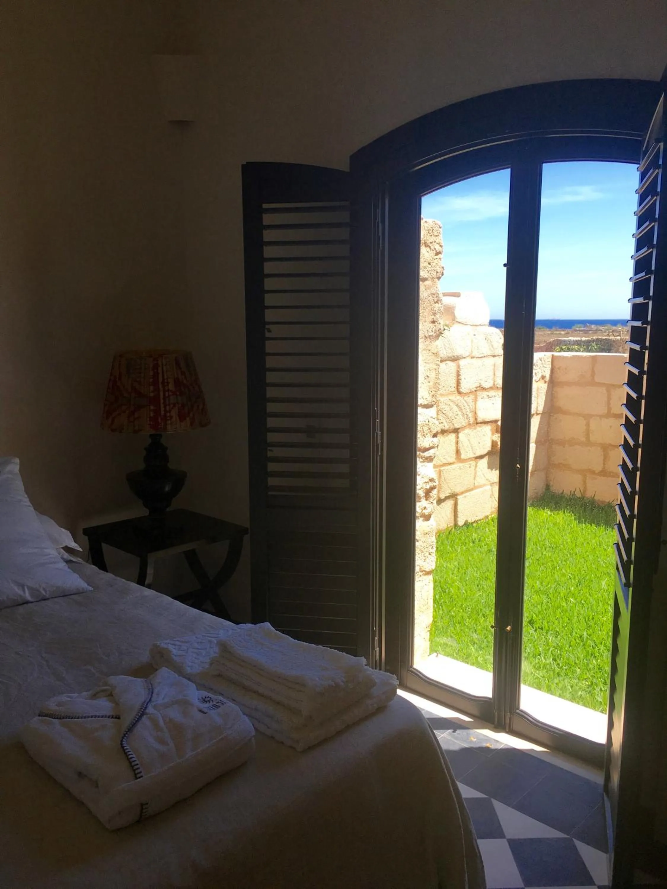 Photo of the whole room, Bed in Il Baglio sull'Acqua