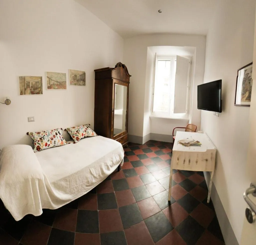 Photo of the whole room, Bed in L'architetto
