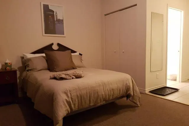 Bed in Cozy Little Studio #16 by Amazing Property Rentals