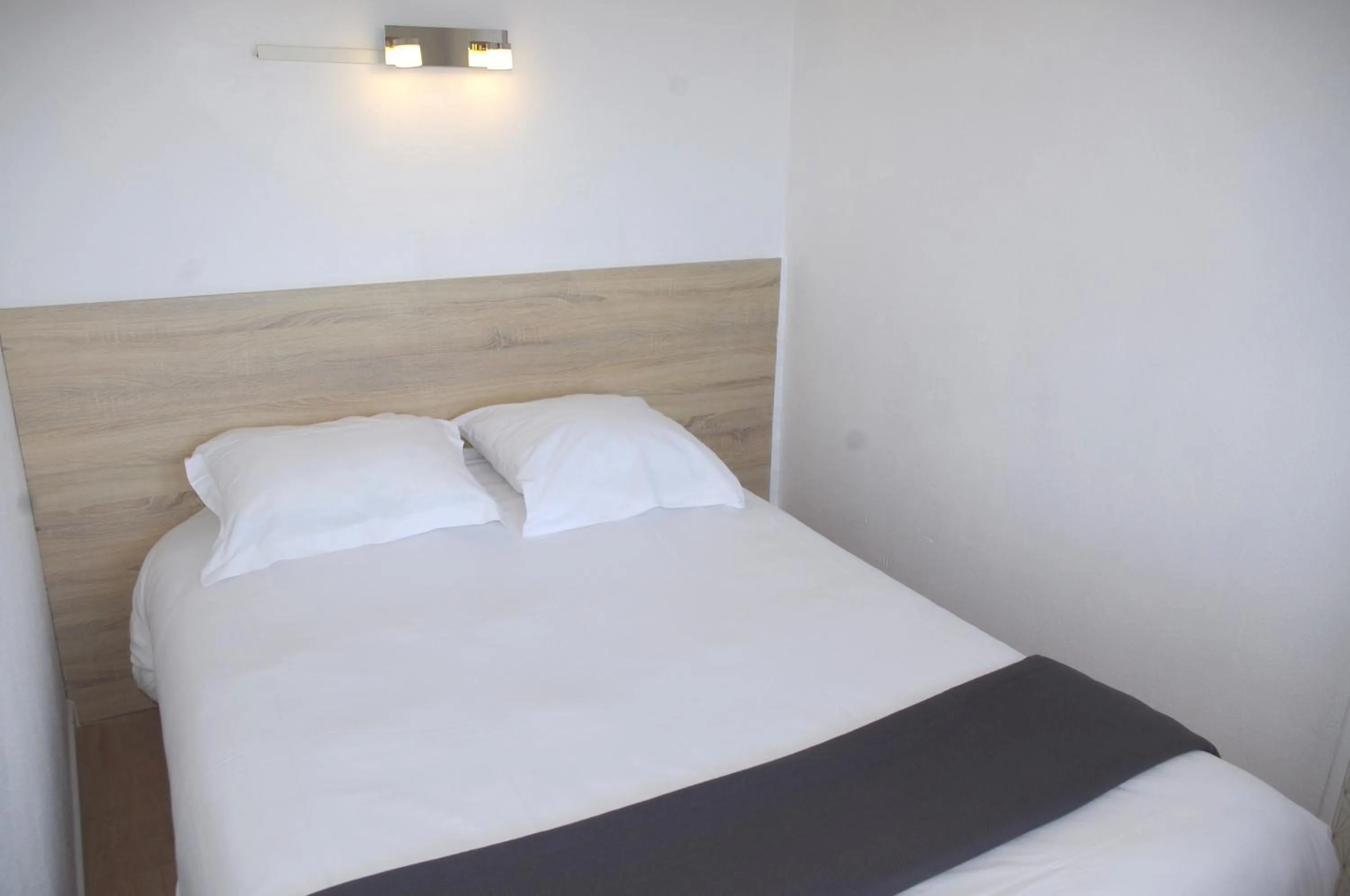 Bed in MOTEL ASCOT - Hotel & Appartements