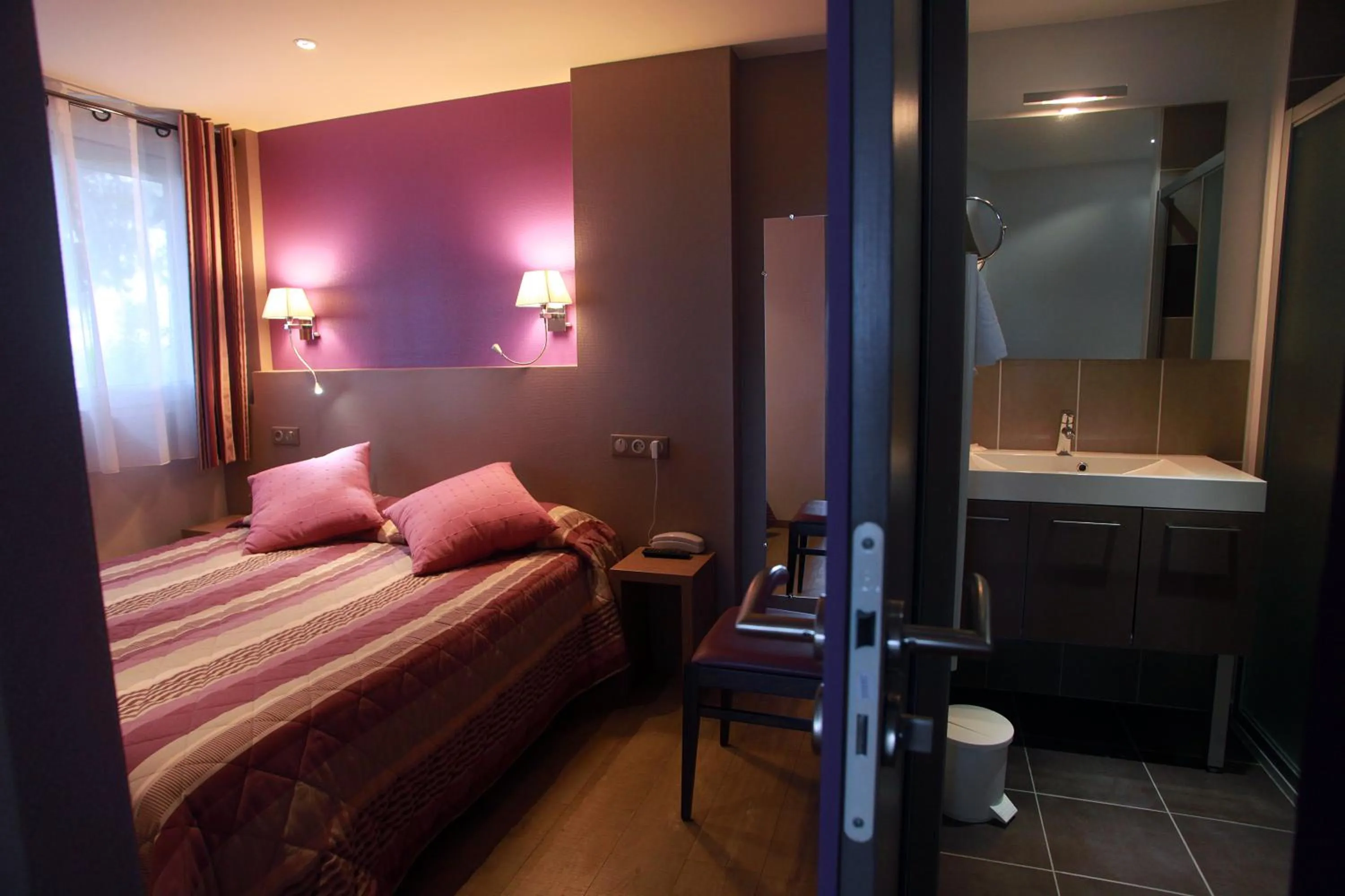 Bed in Hôtel restaurant LOGIS HOTELLERIE DE BALAJAN