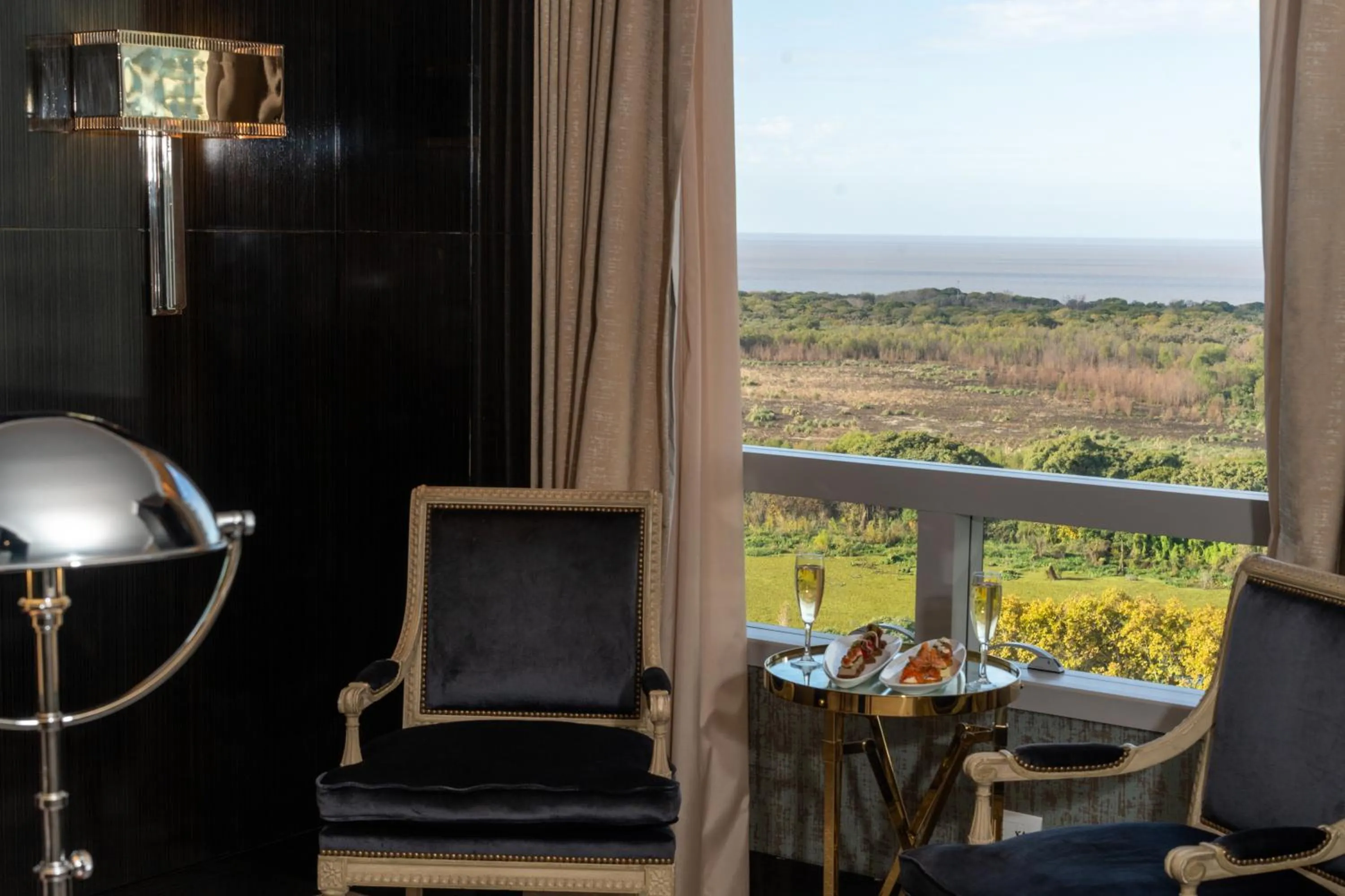 Seating area in Alvear Icon Hotel