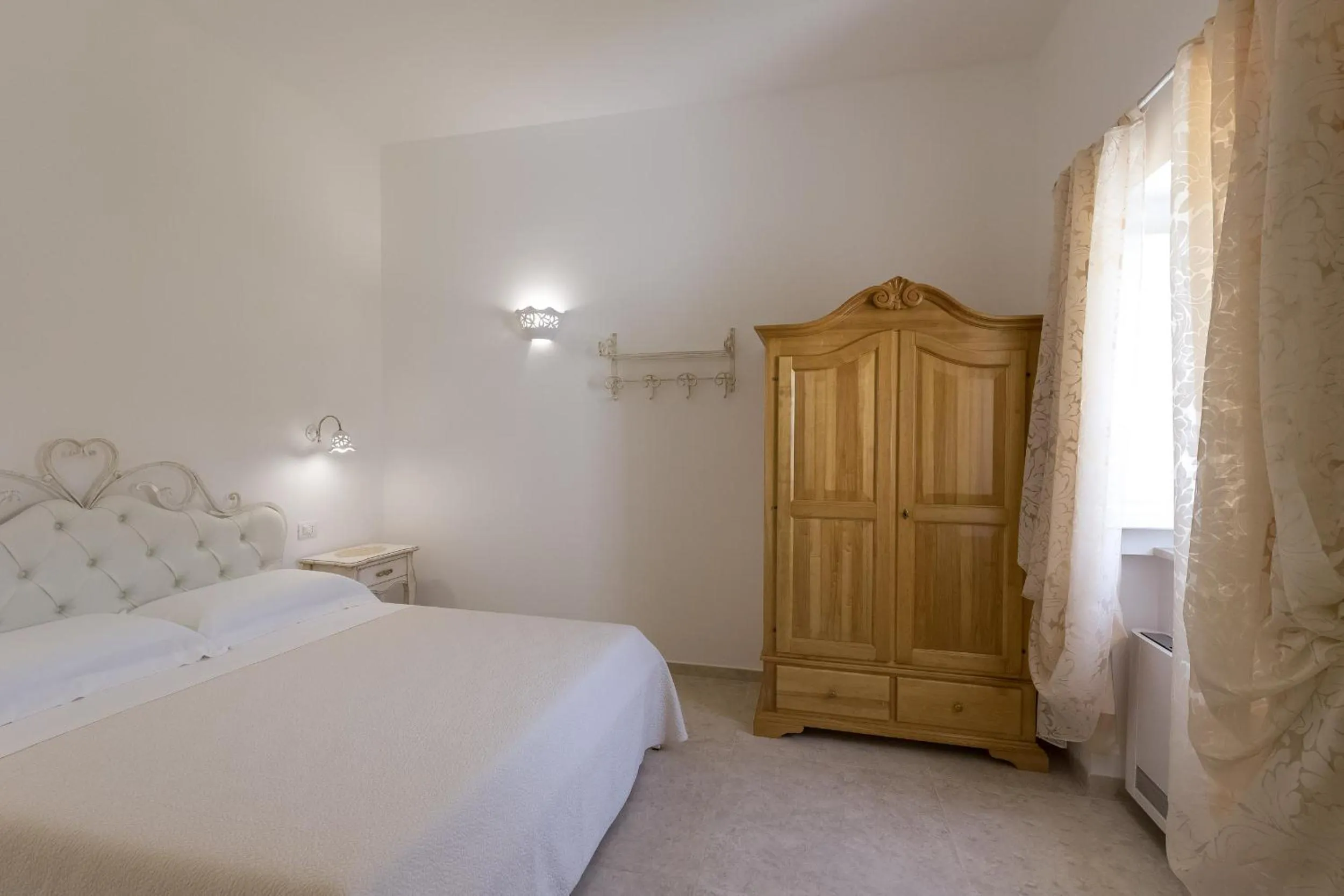 Photo of the whole room, Bed in Dimora San Quirico - bed e breakfast - Cisternino