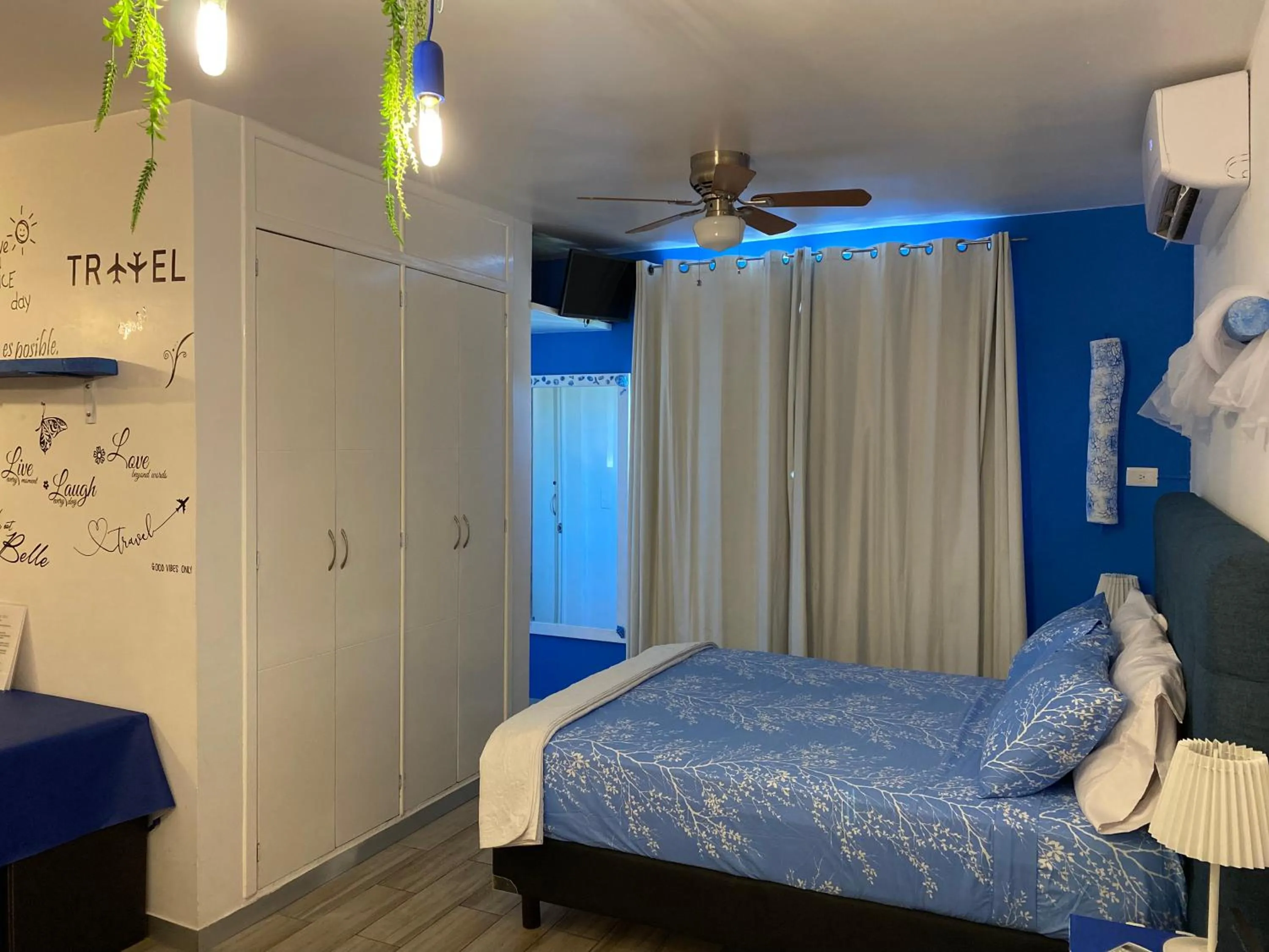 wardrobe, Bed in Tropical apartment