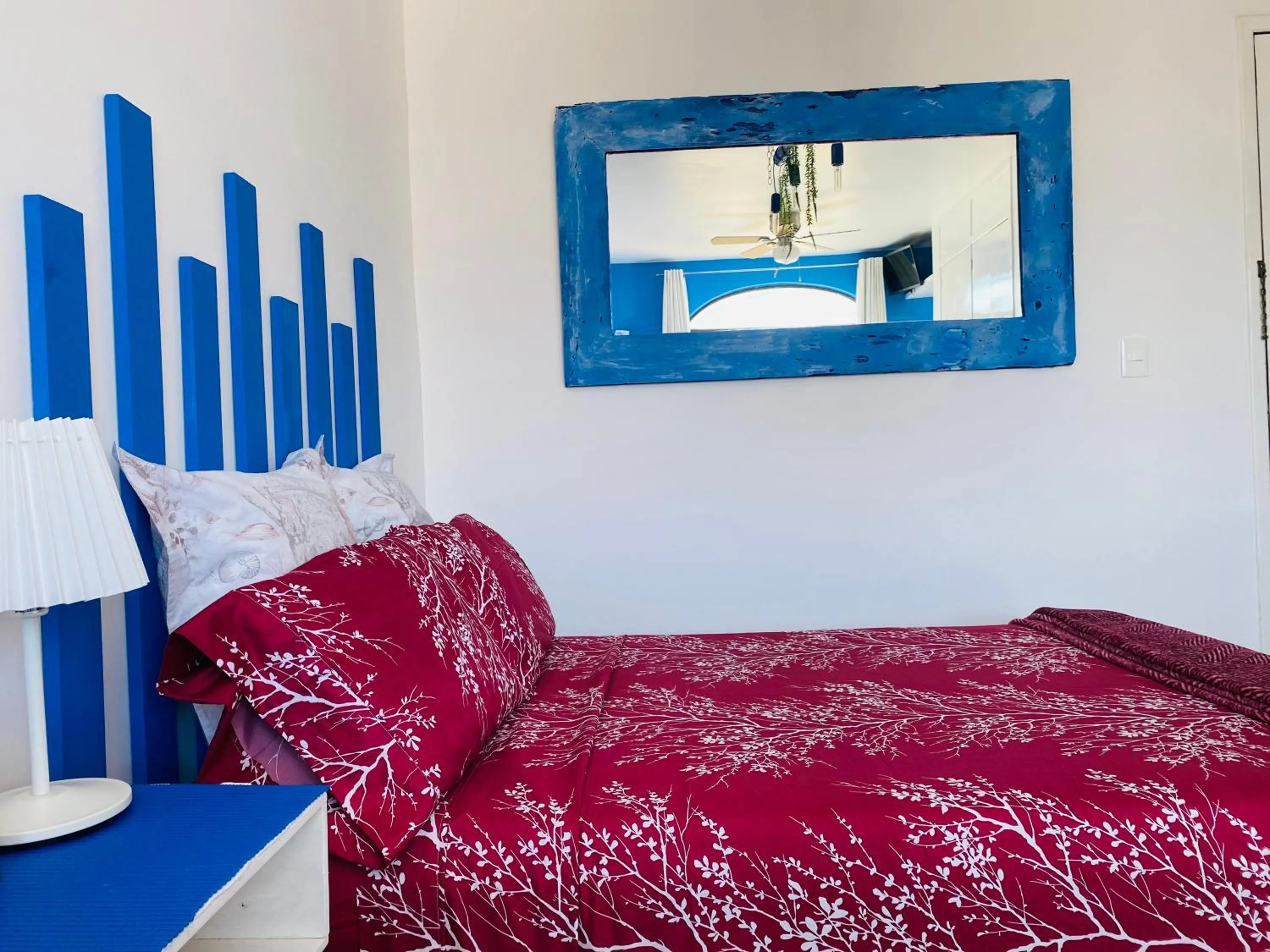 Bed in Tropical apartment