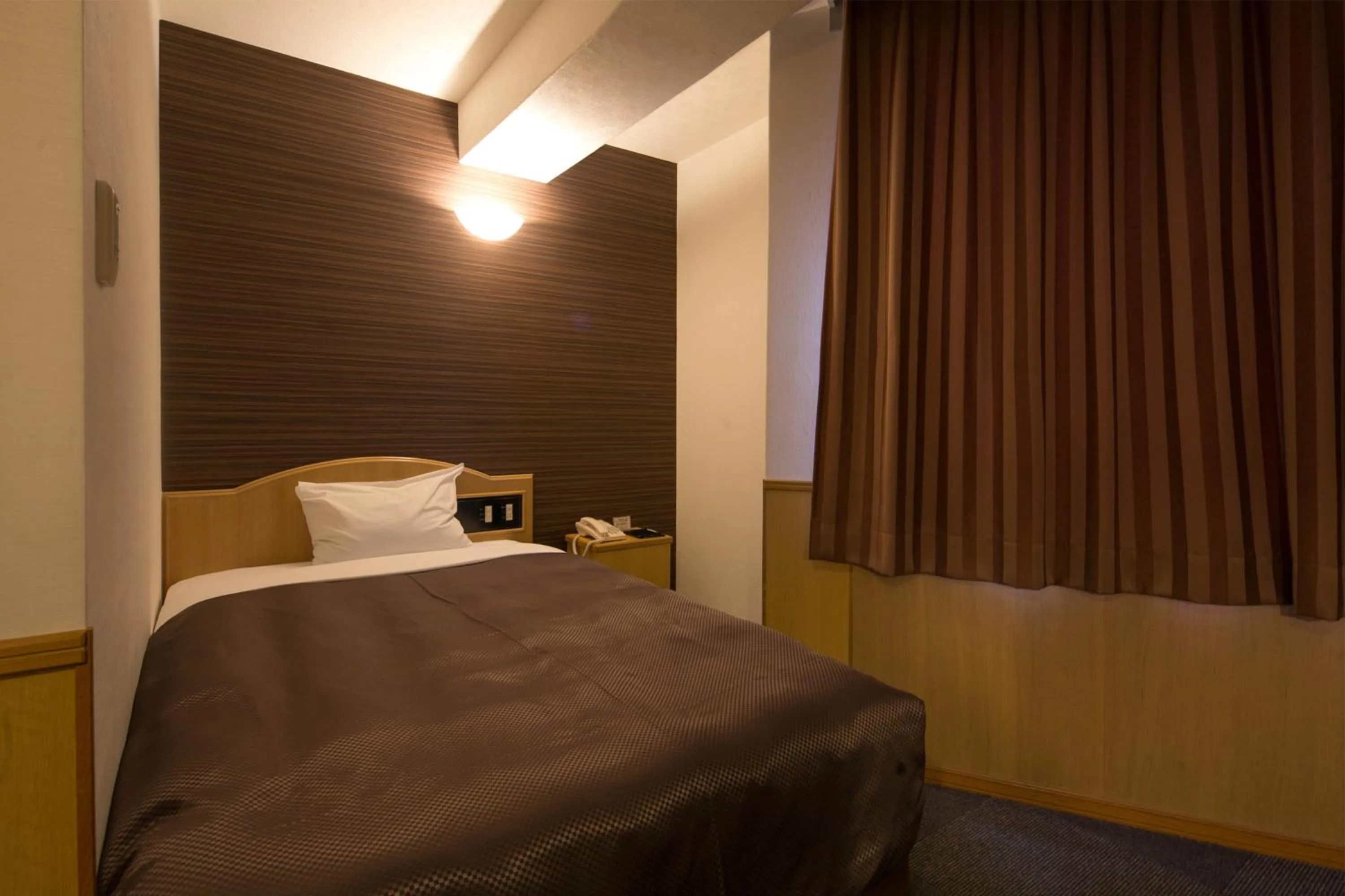 Decorative detail, Bed in Miyakonojo Green Hotel