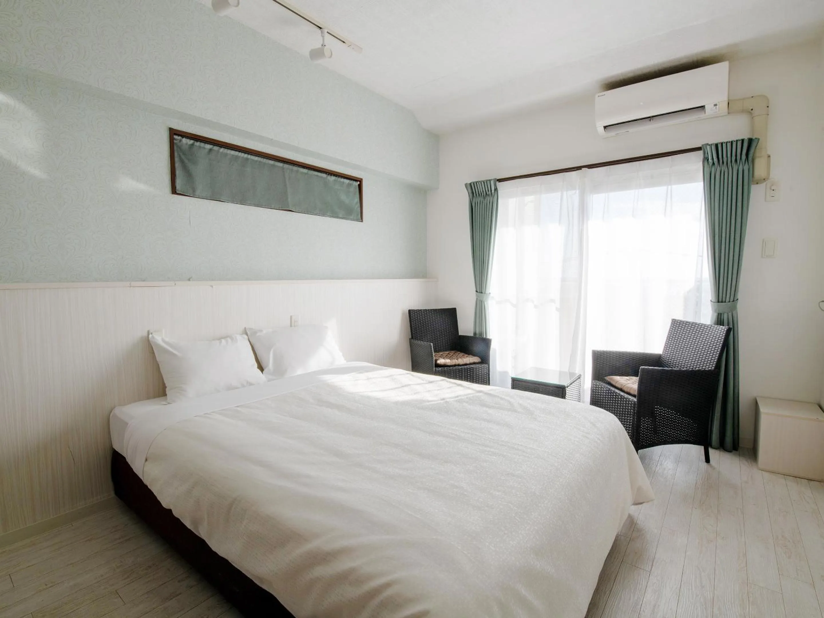 Bed in Cozy Stay In Itoman