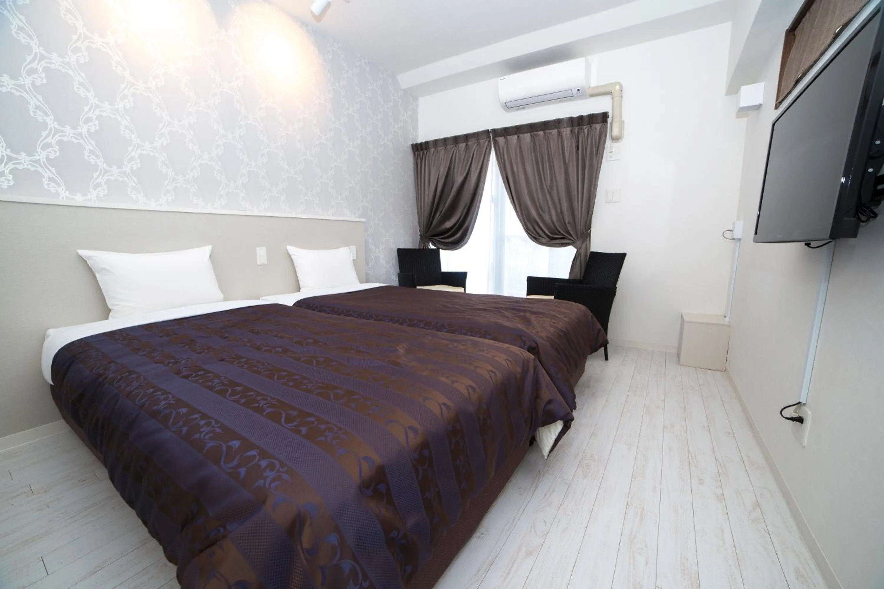 Bed in Cozy Stay In Itoman