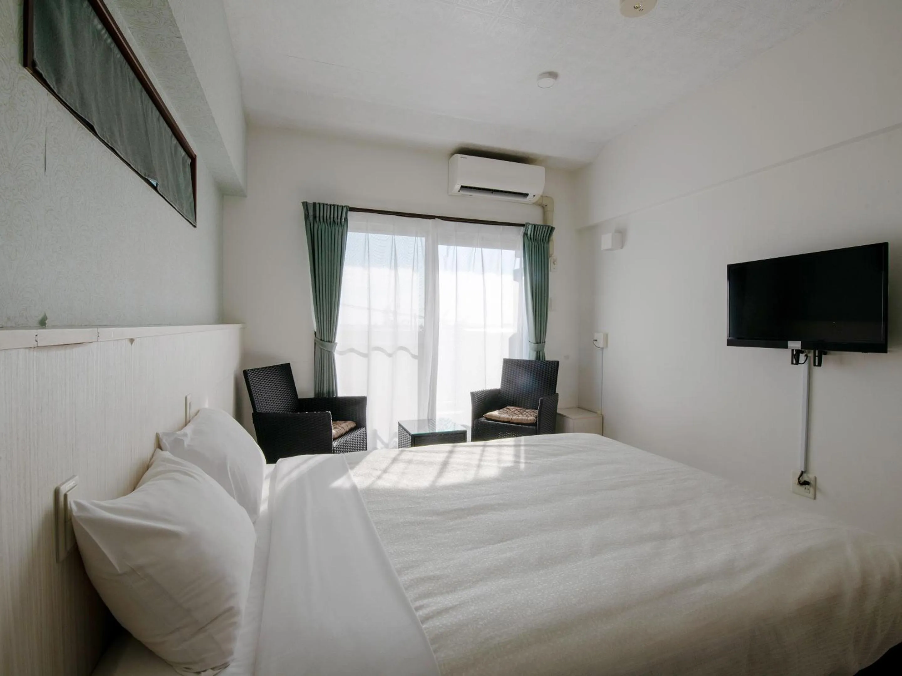 Bed in Cozy Stay In Itoman