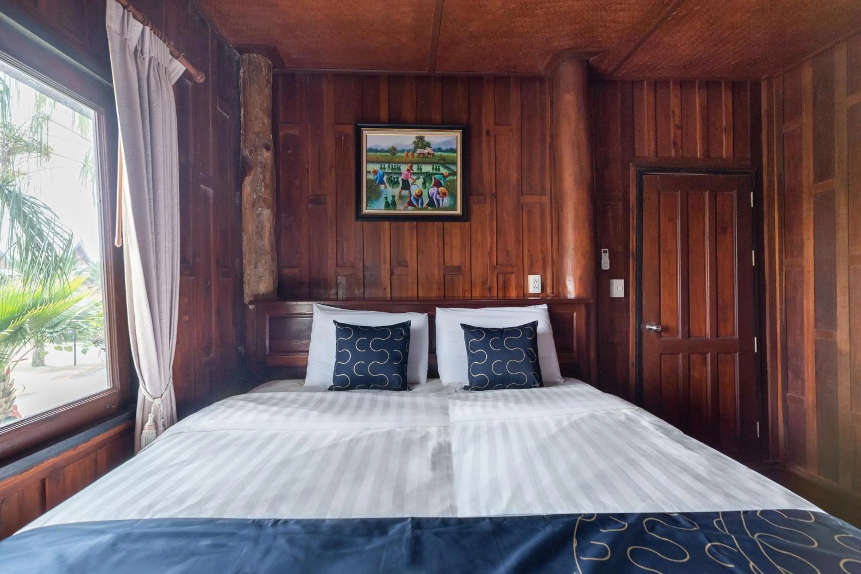 Bedroom in Capital O 805 Suan Palm Farm Nok Resort