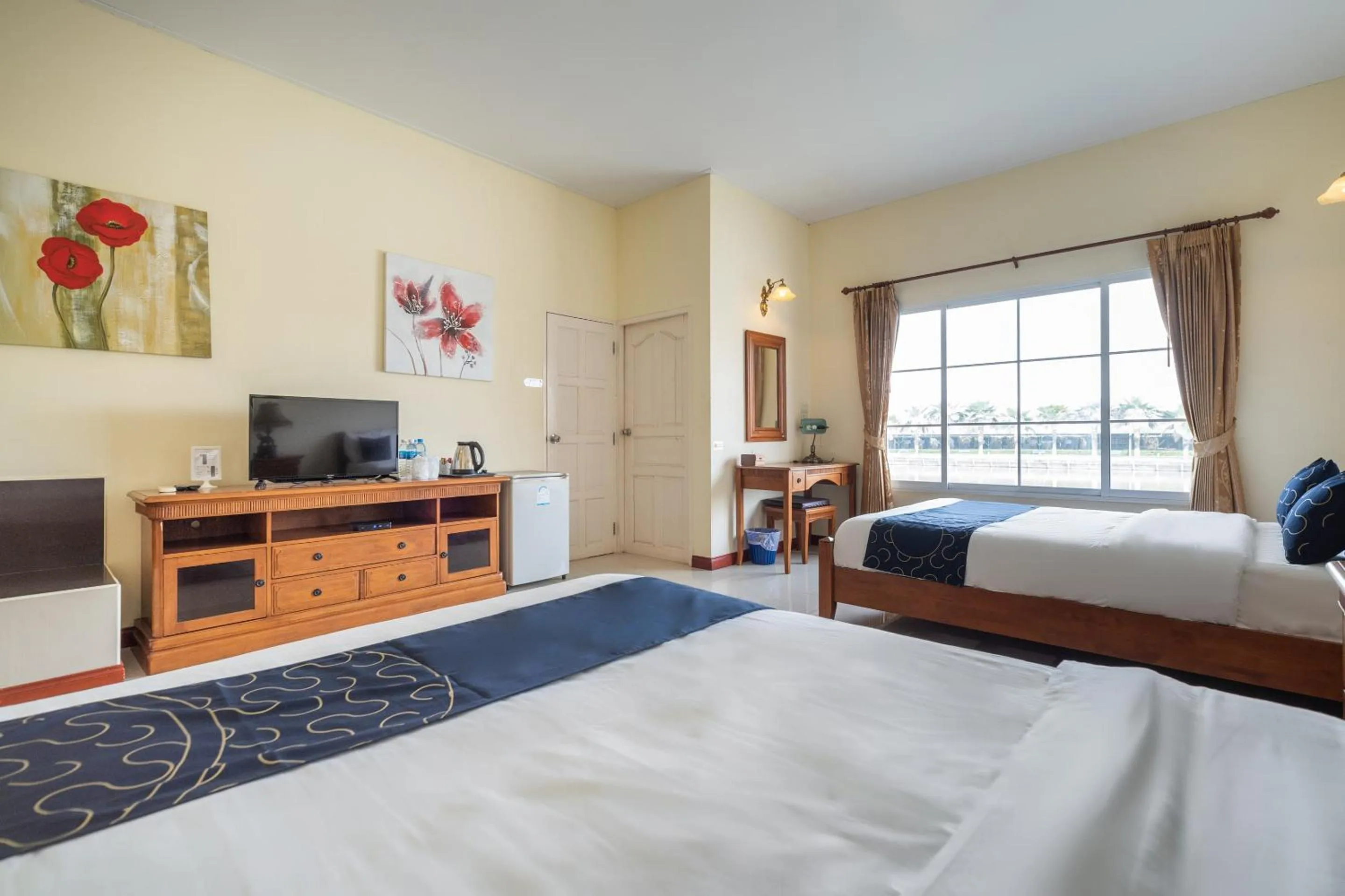 Bedroom in Capital O 805 Suan Palm Farm Nok Resort