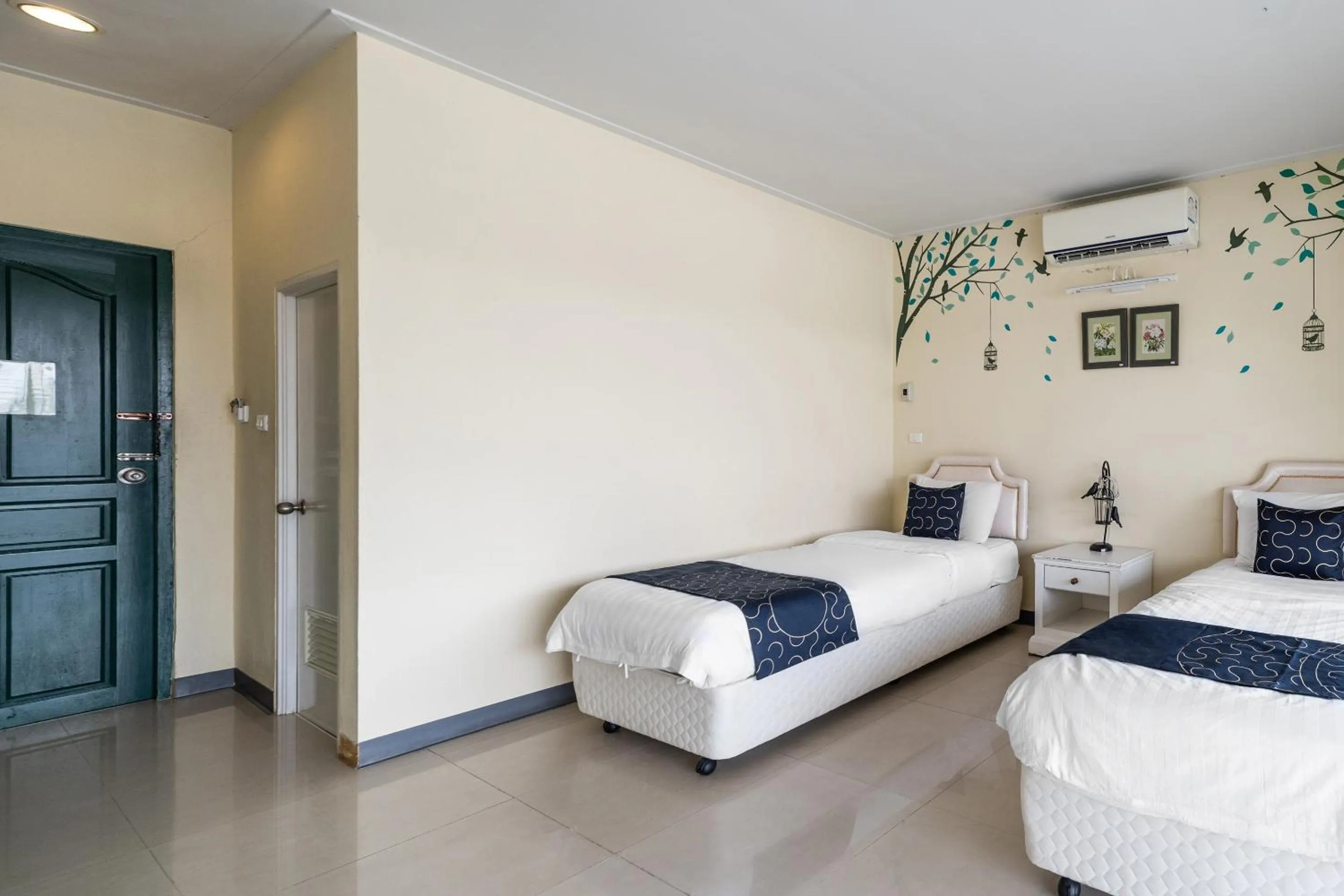 Bedroom in Capital O 805 Suan Palm Farm Nok Resort