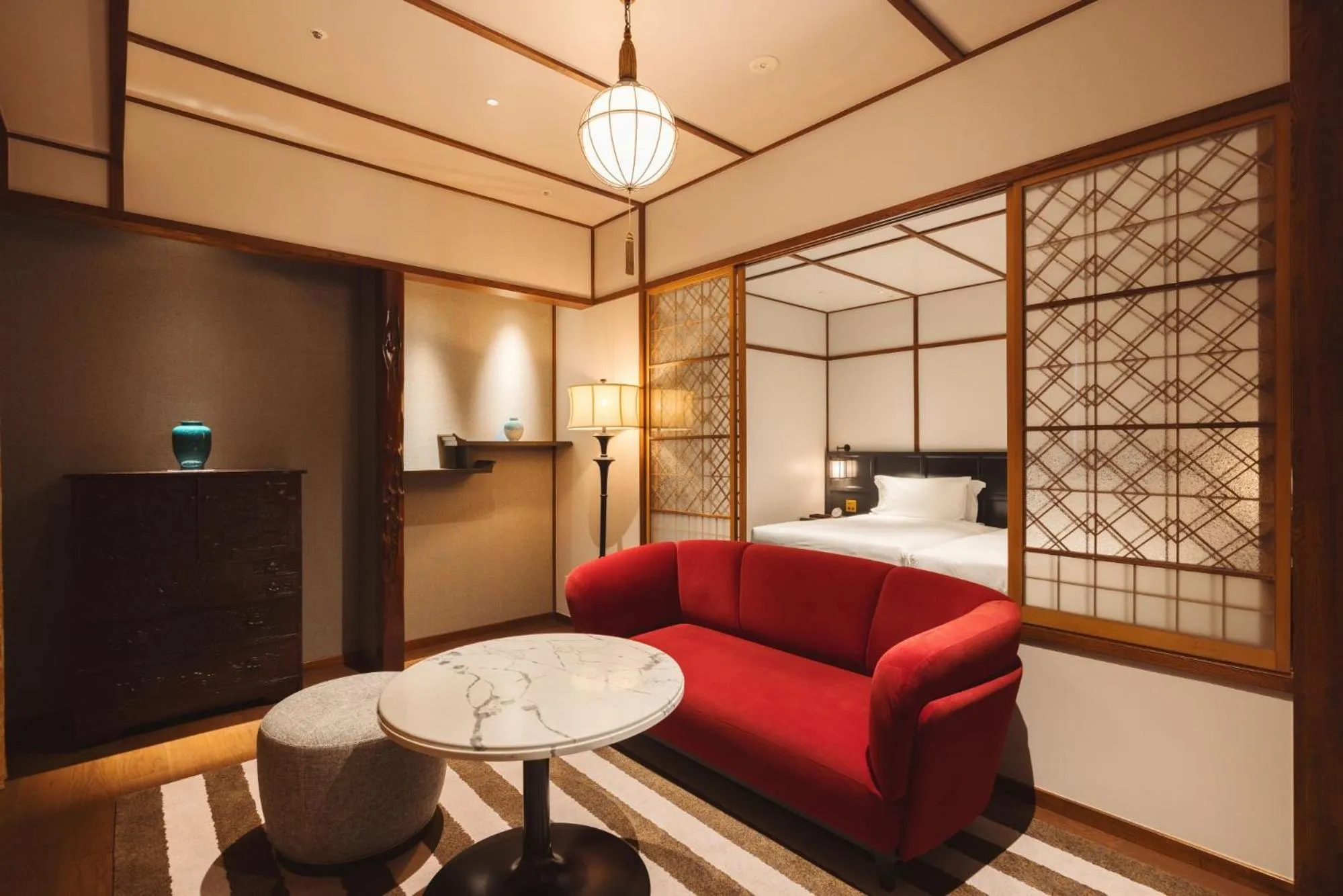 Living room, Bed in Mampei Hotel