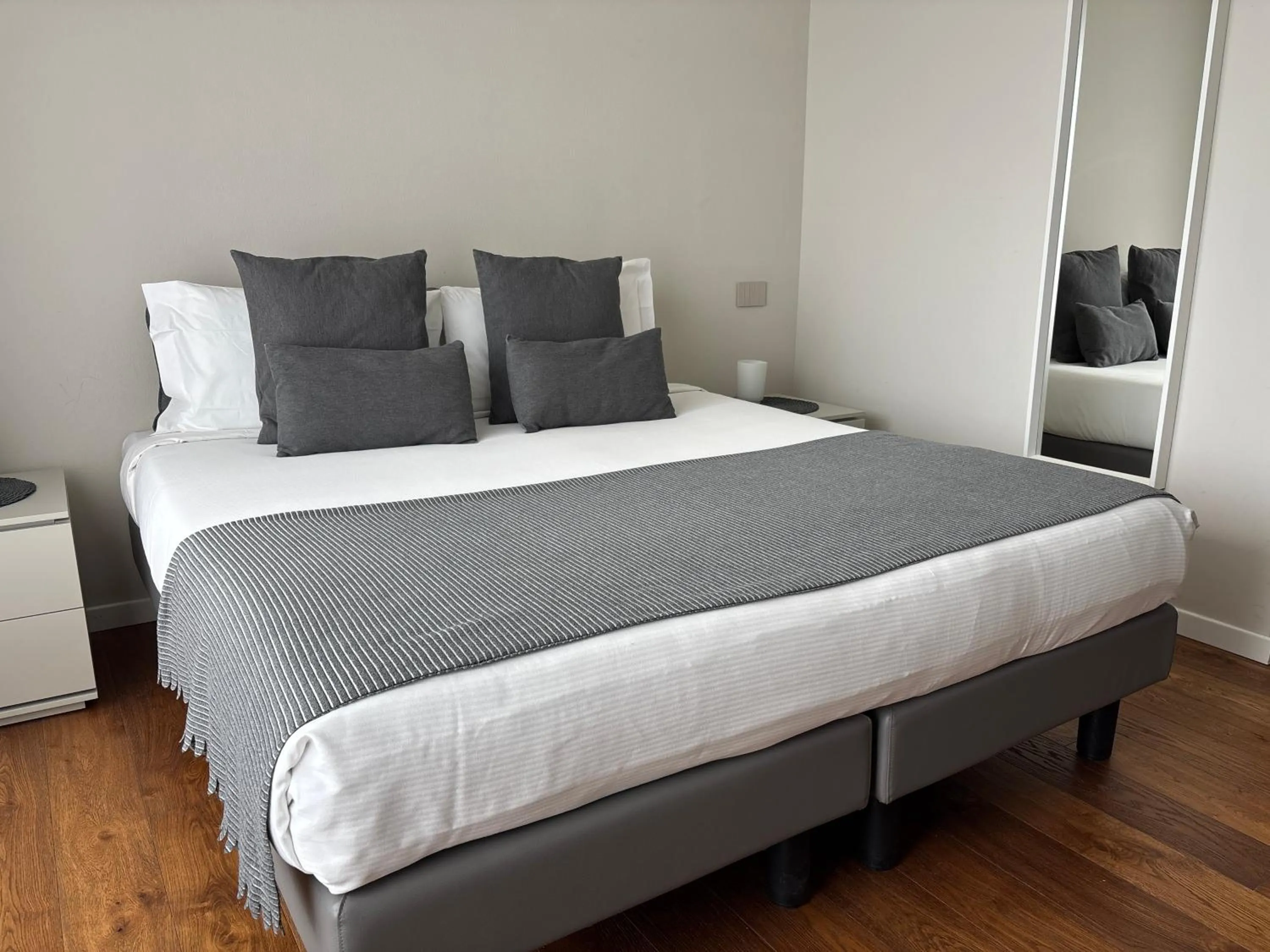 Bed in Aparthotel Isola