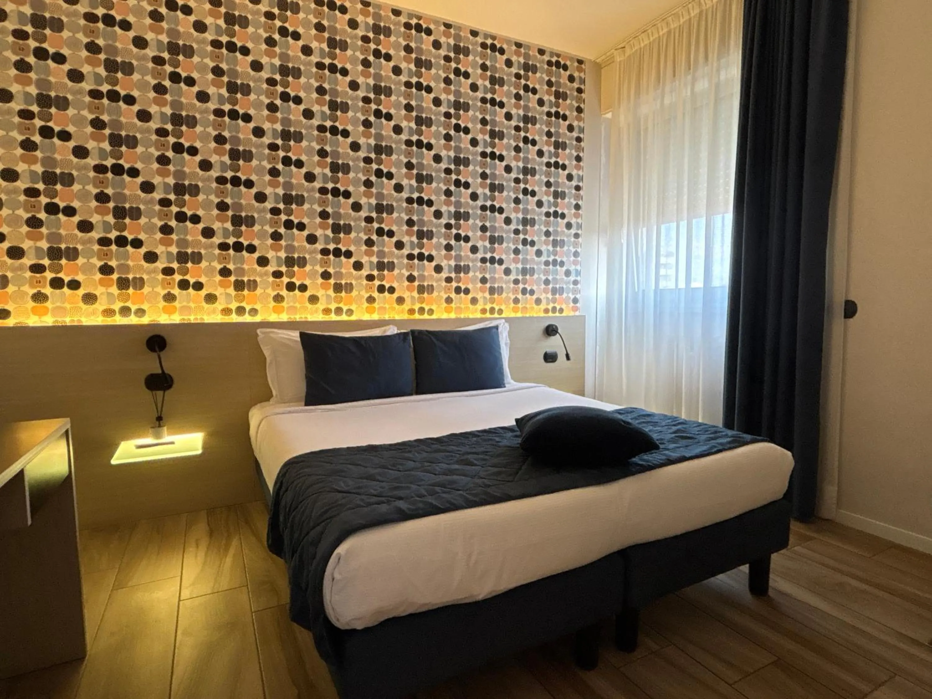 Bed in Aparthotel Isola