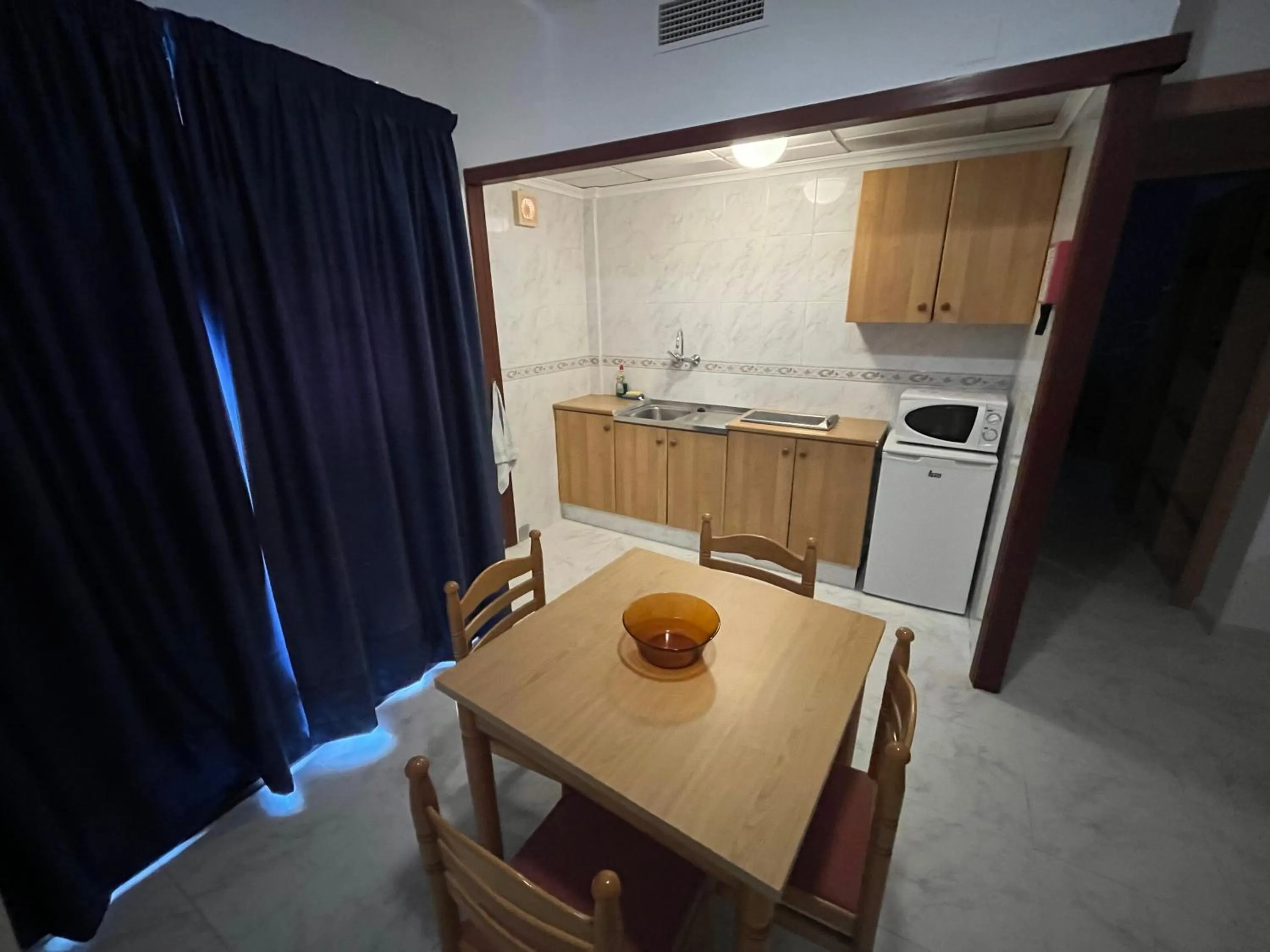 Kitchen or kitchenette in Apartamentos Playa Sol