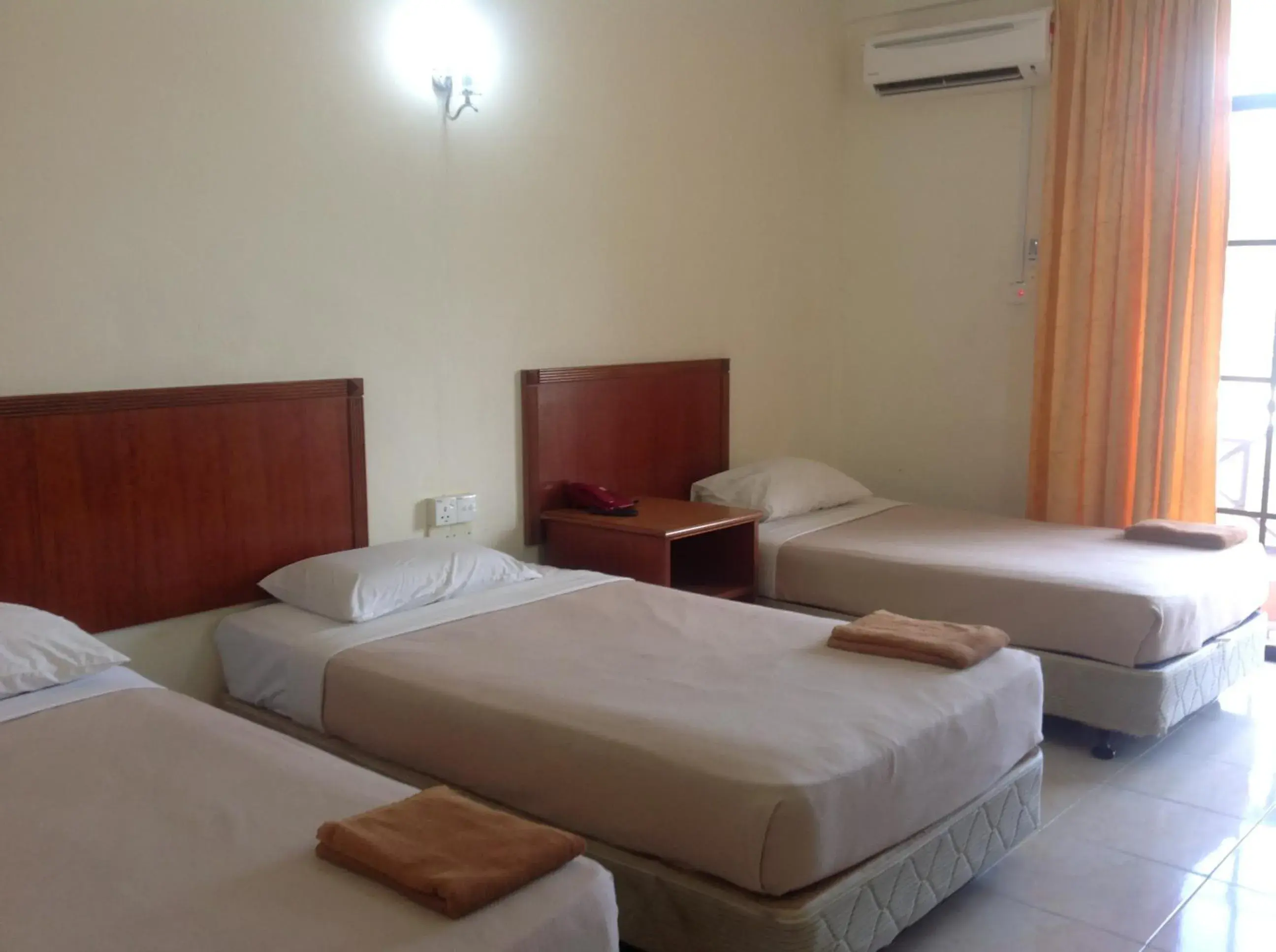 Standard Triple Room in Tanjung Demong Beach Resort Standard Triple Room in Tanjung Demong Beach Resort