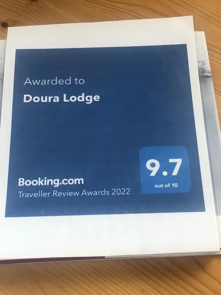 Property logo or sign in Doura Lodge