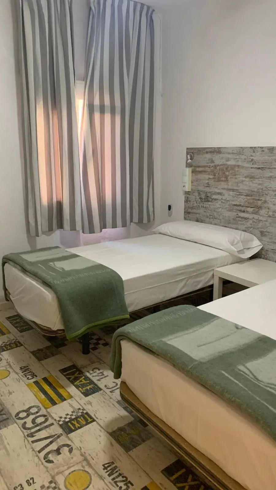 Bed in Casa de Huéspedes Almansa Bed in Casa de Huéspedes Almansa