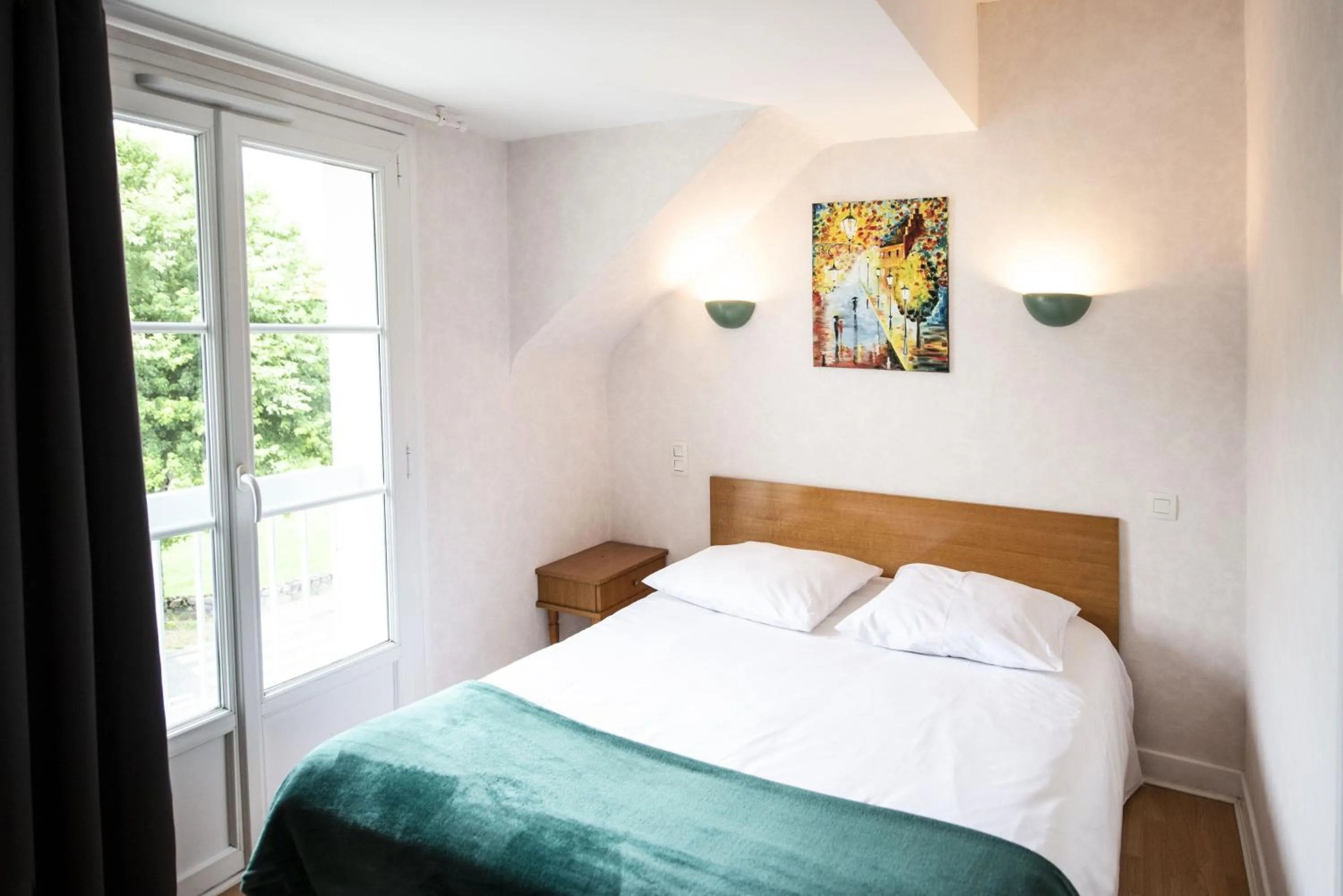 Bed in Hôtel des Barrages