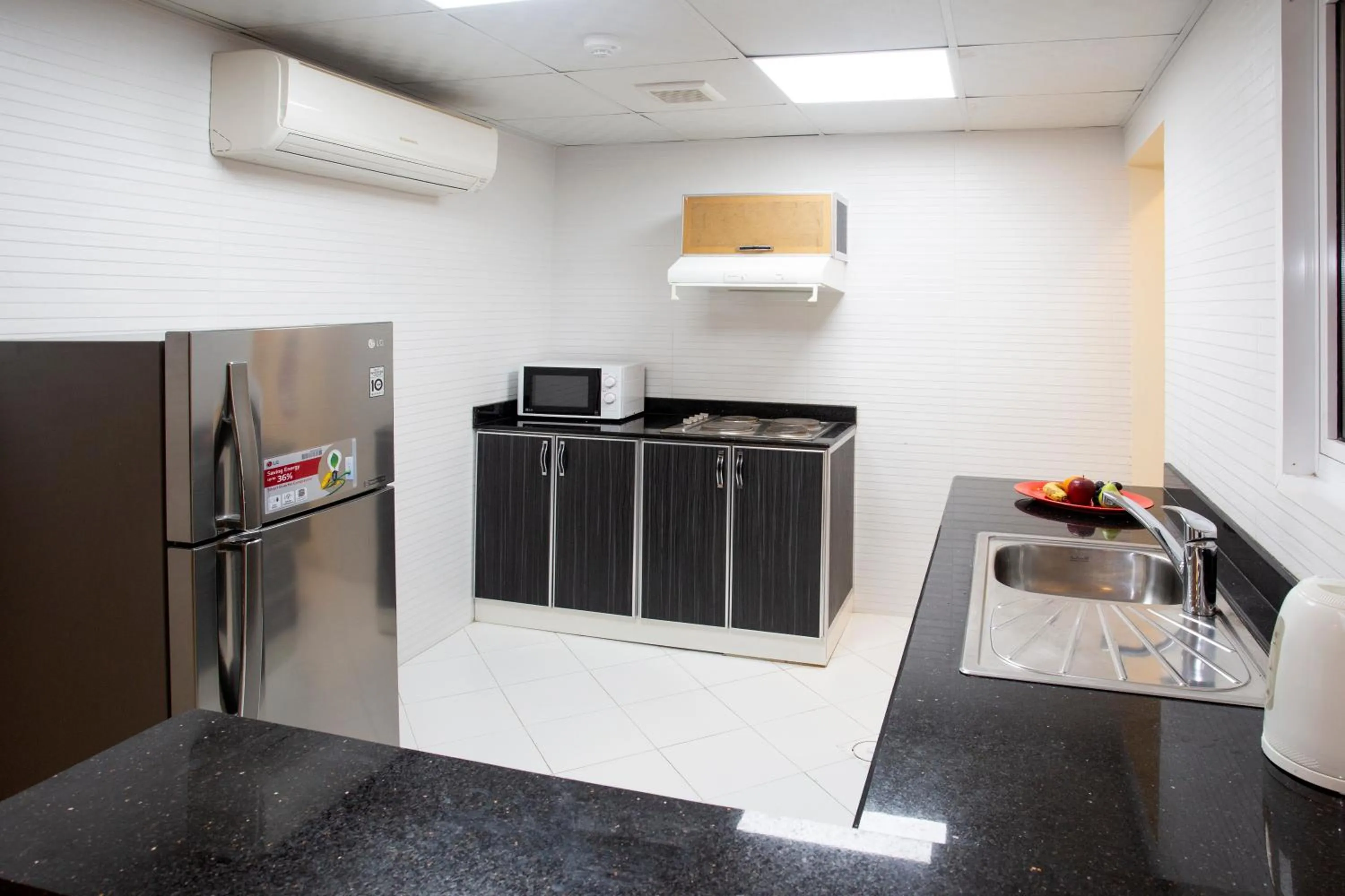 Kitchen or kitchenette in Muscat Hills Hotel