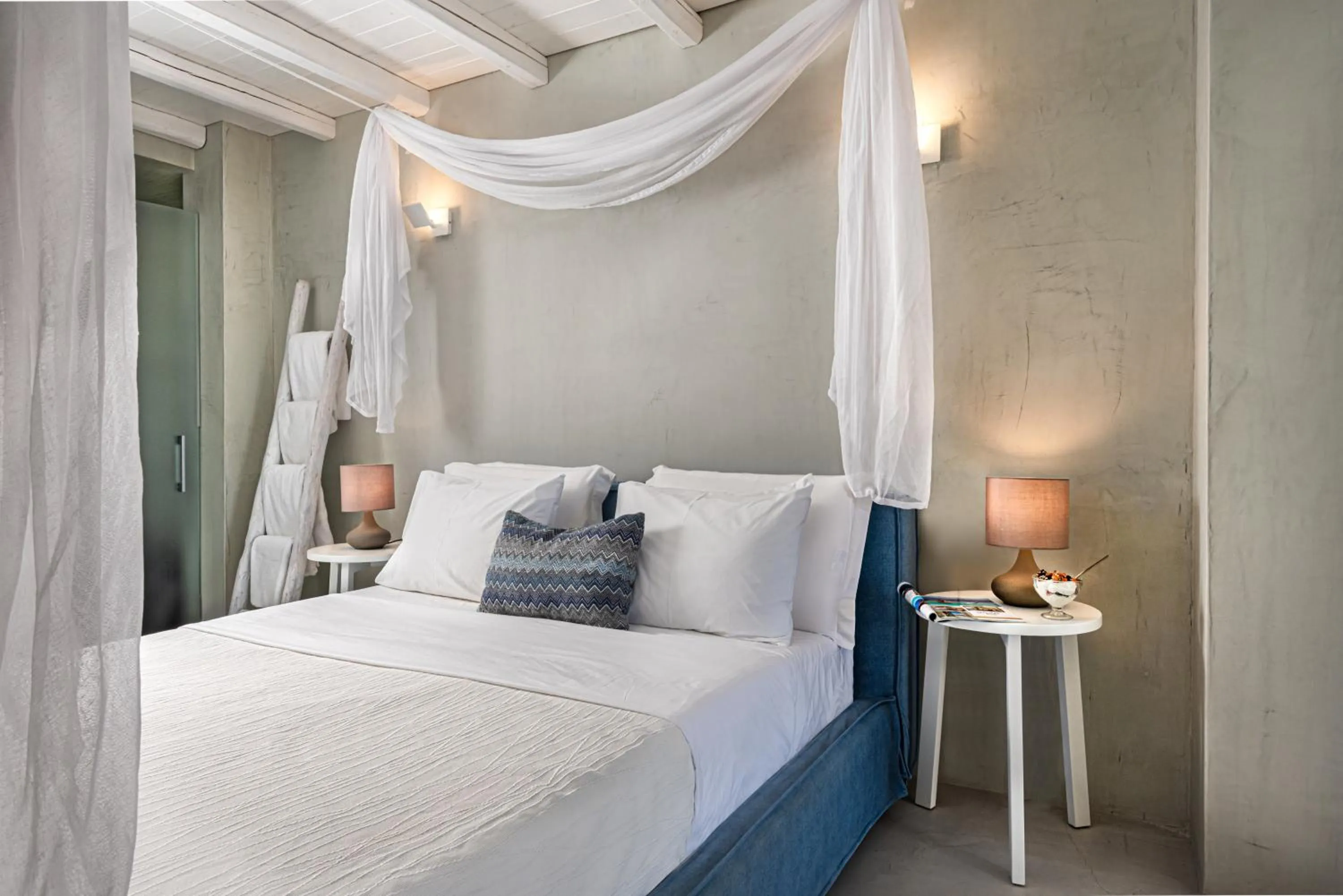 Bed in Mythical Blue Luxury Suites