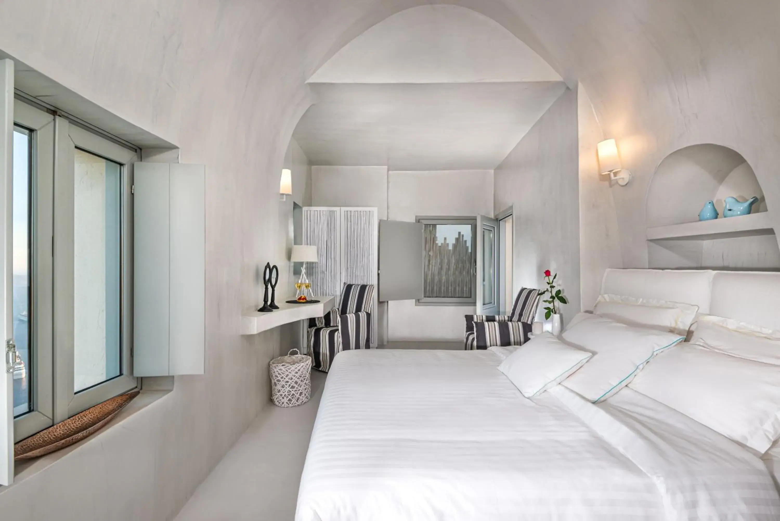 Seating area, Bed in Mythical Blue Luxury Suites Seating area, Bed in Mythical Blue Luxury Suites