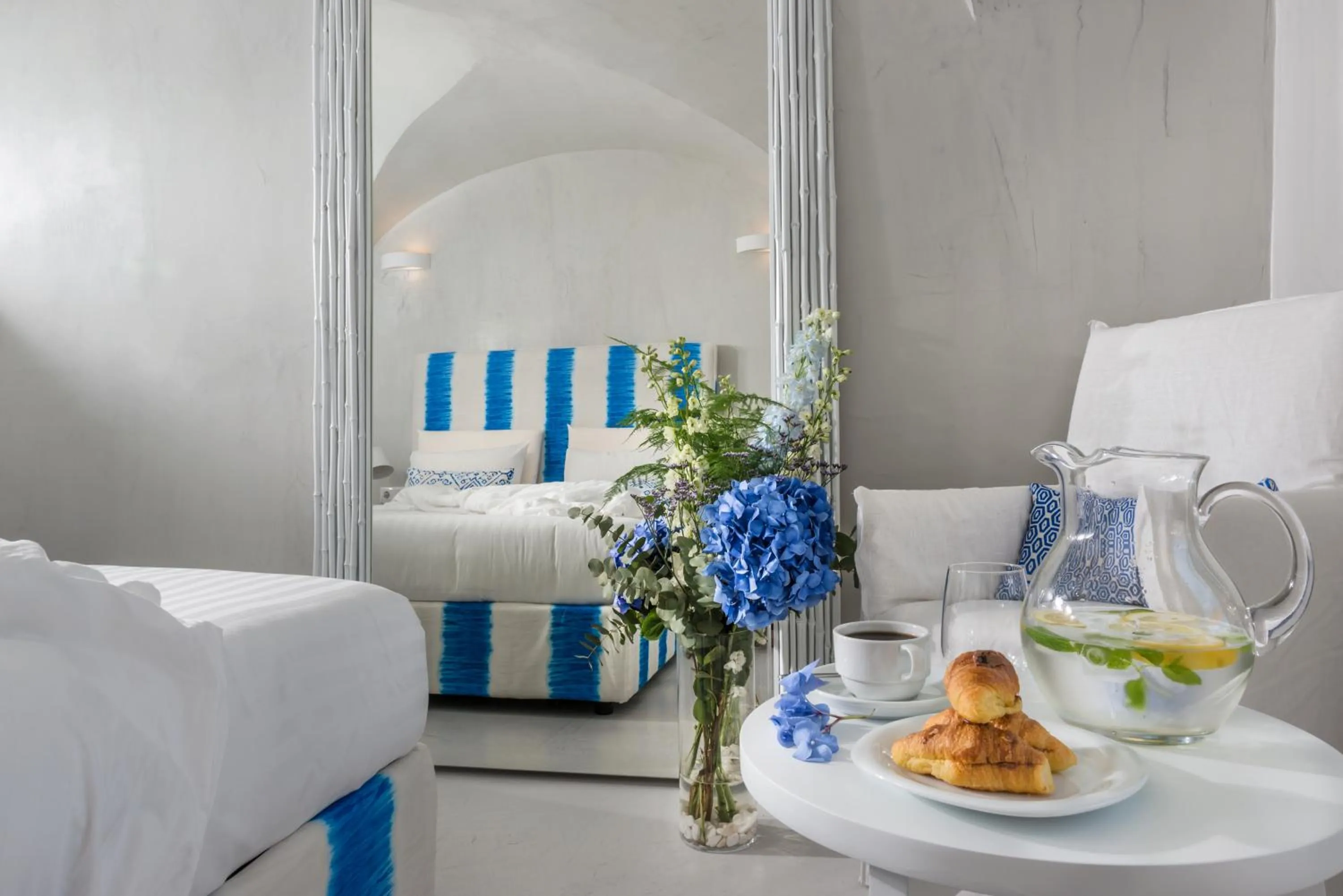 Seating area, Bed in Mythical Blue Luxury Suites