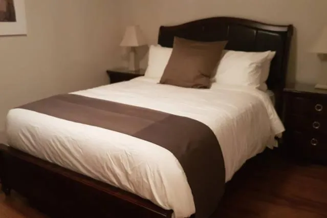 Bed in Two-Bedroom Apartment Sweet #4 by Amazing Property Rentals
