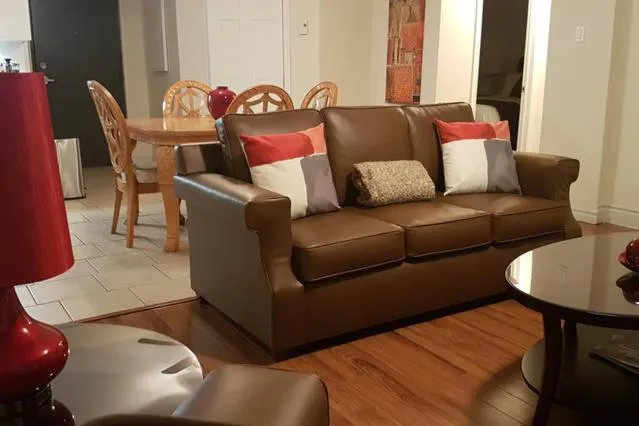 Living room in Two-Bedroom Apartment Sweet #4 by Amazing Property Rentals