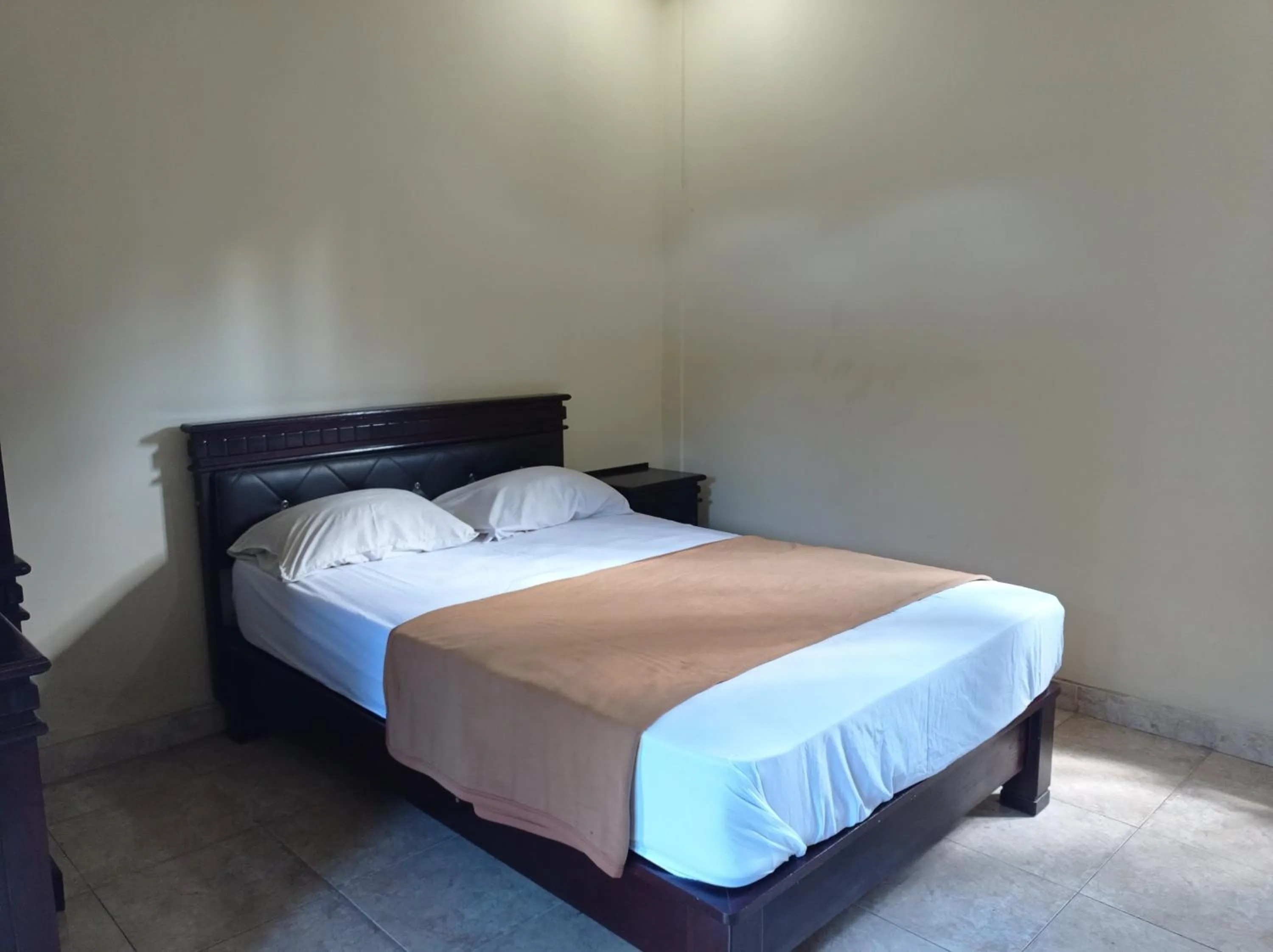 Bed in Hotel Mawar Sari Mitra RedDoorz