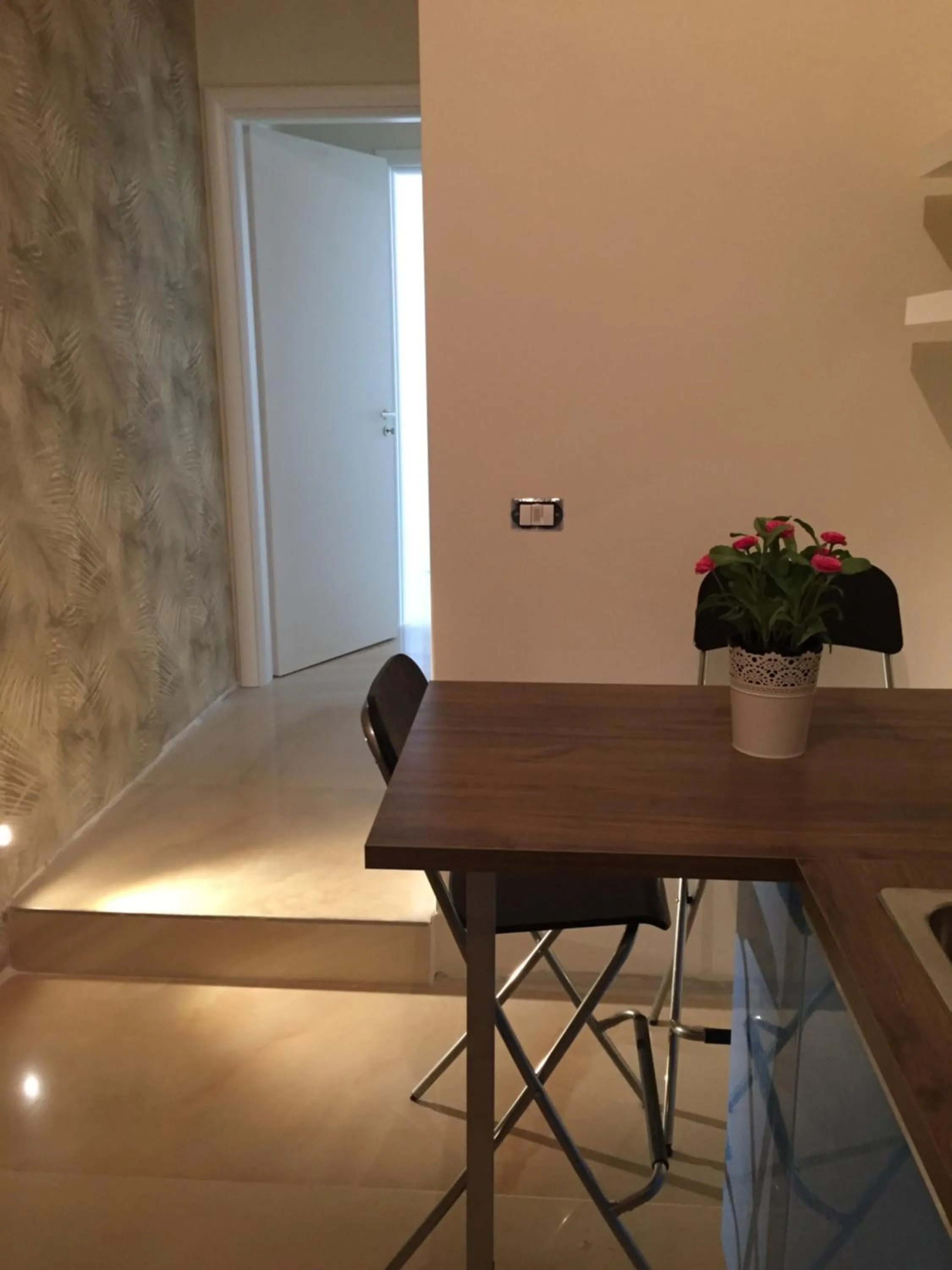 Communal lounge/ TV room in Aquila house