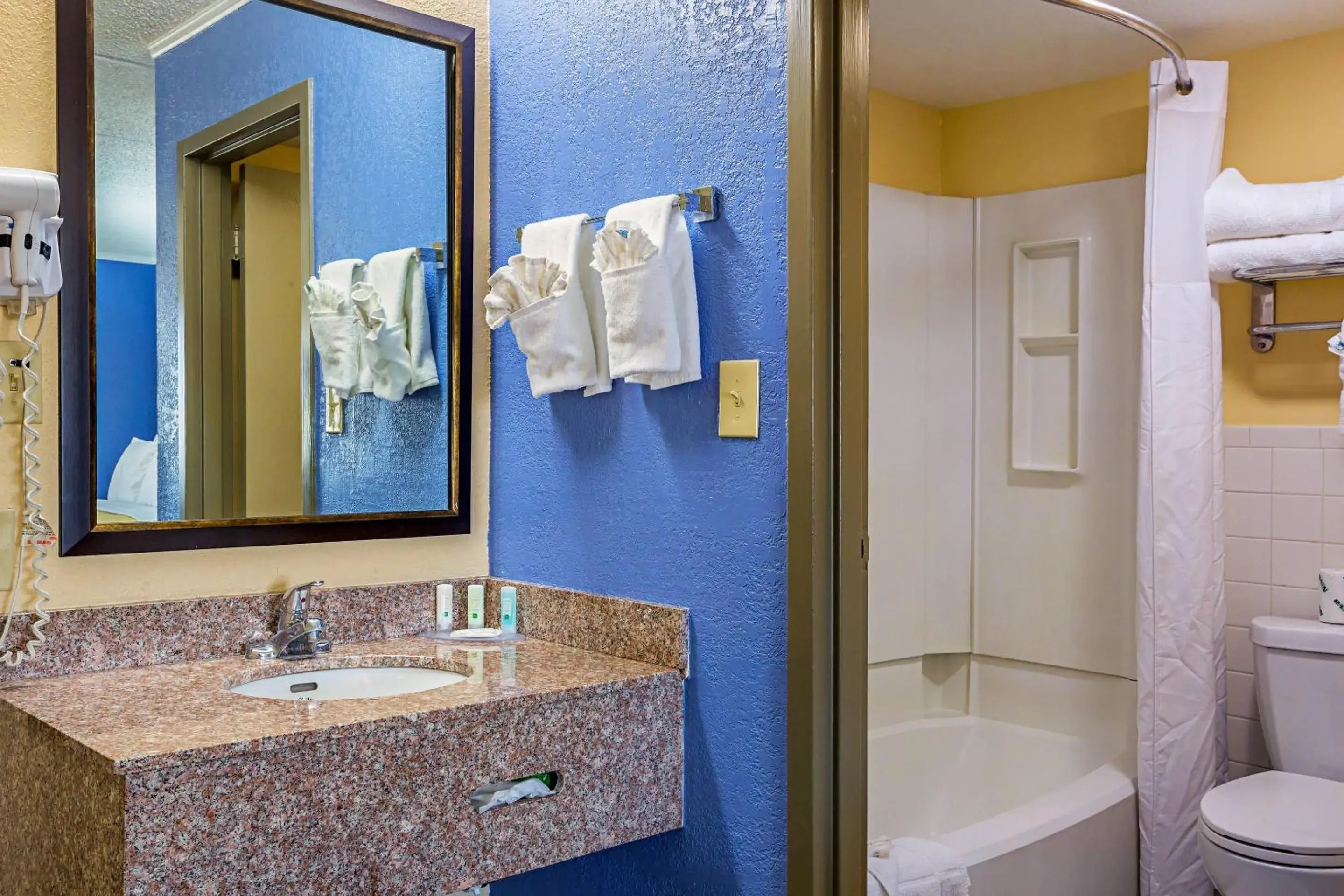 Bedroom in Quality Inn & Suites near Six Flags East Bedroom in Quality Inn & Suites near Six Flags East