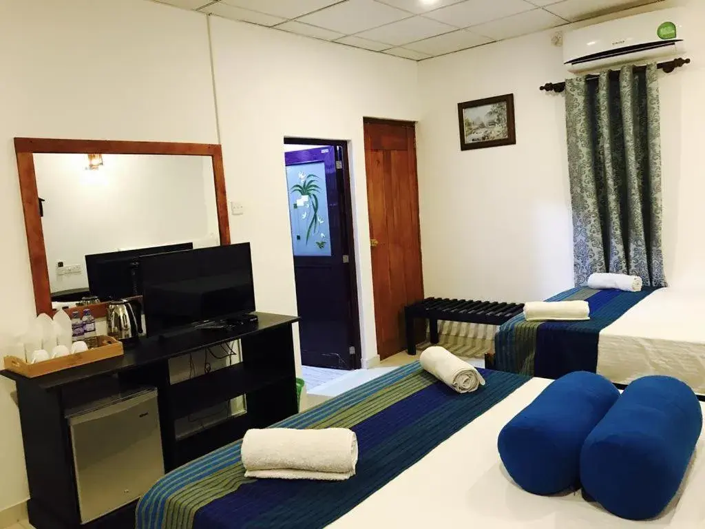 Decorative detail, Bed in Sunshine Resort & Spa Sigiriya Decorative detail, Bed in Sunshine Resort & Spa Sigiriya