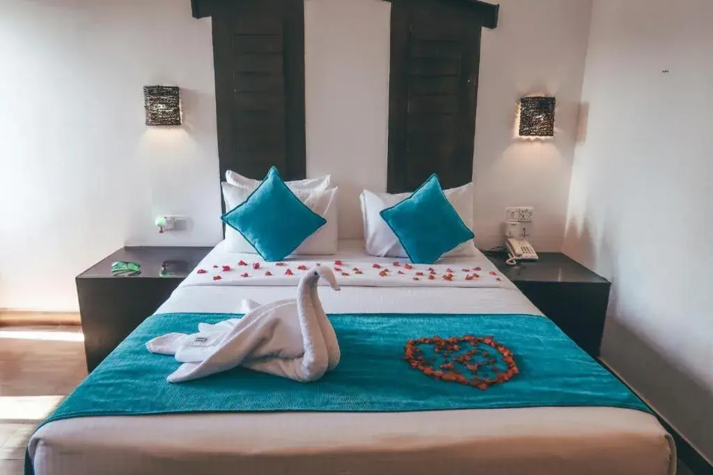 Bed in Sunshine Resort & Spa Sigiriya Bed in Sunshine Resort & Spa Sigiriya